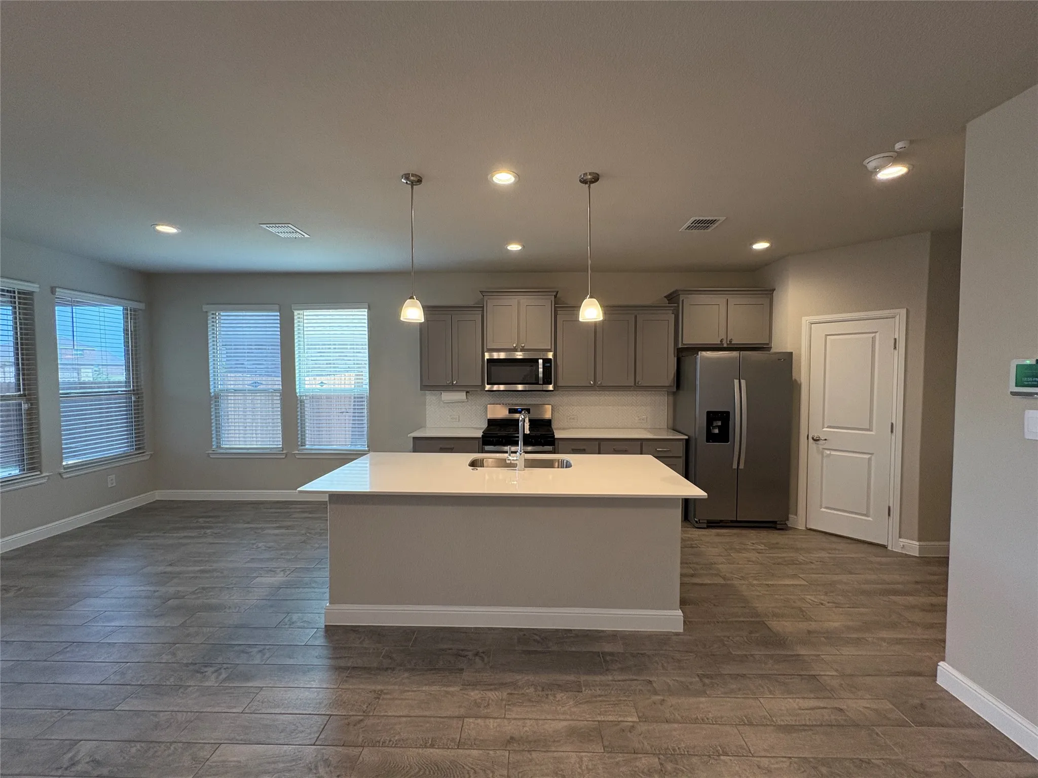 Kitchen with Island ad quartz countertops