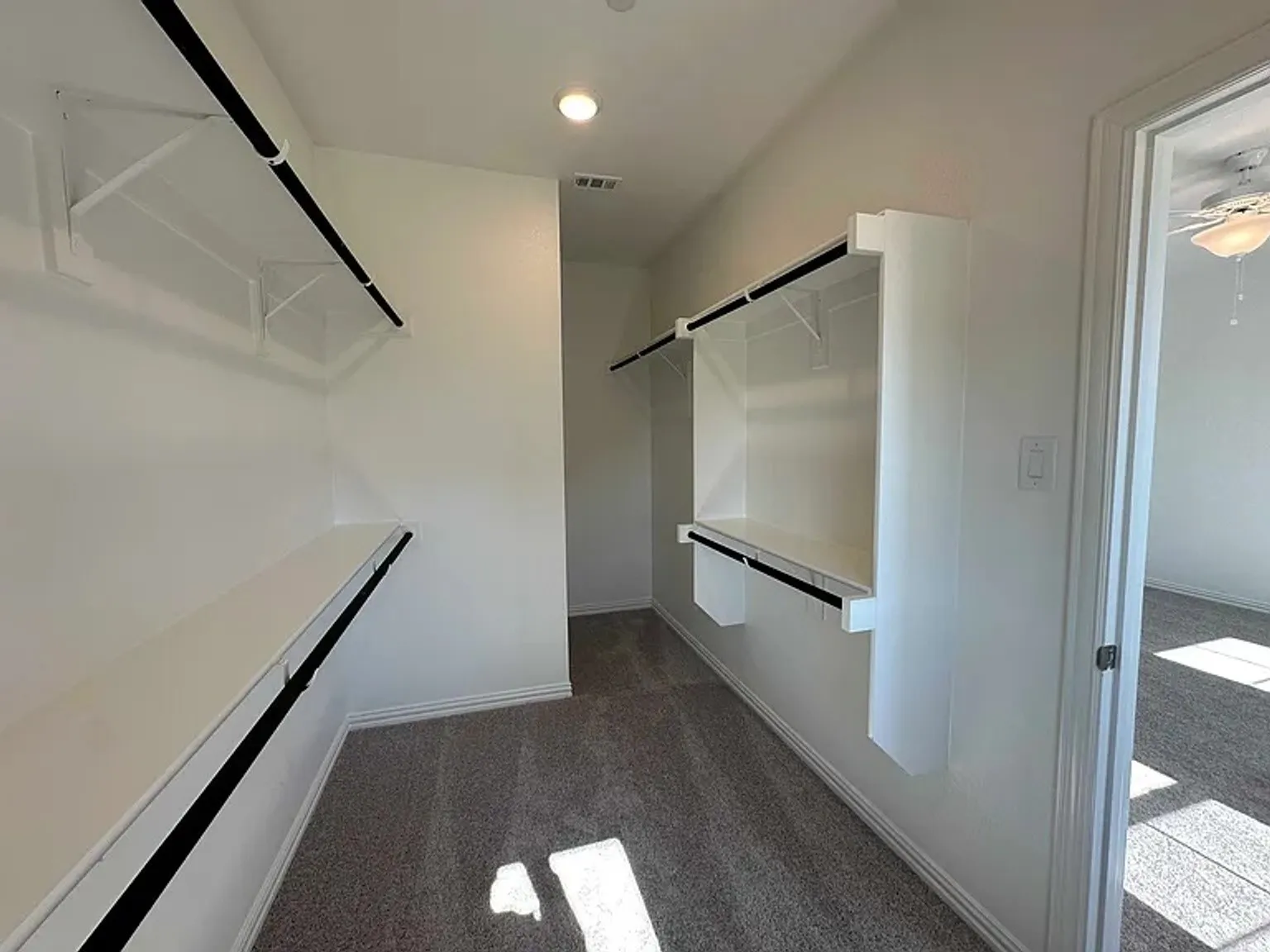 Built-in shelving with hanging rods