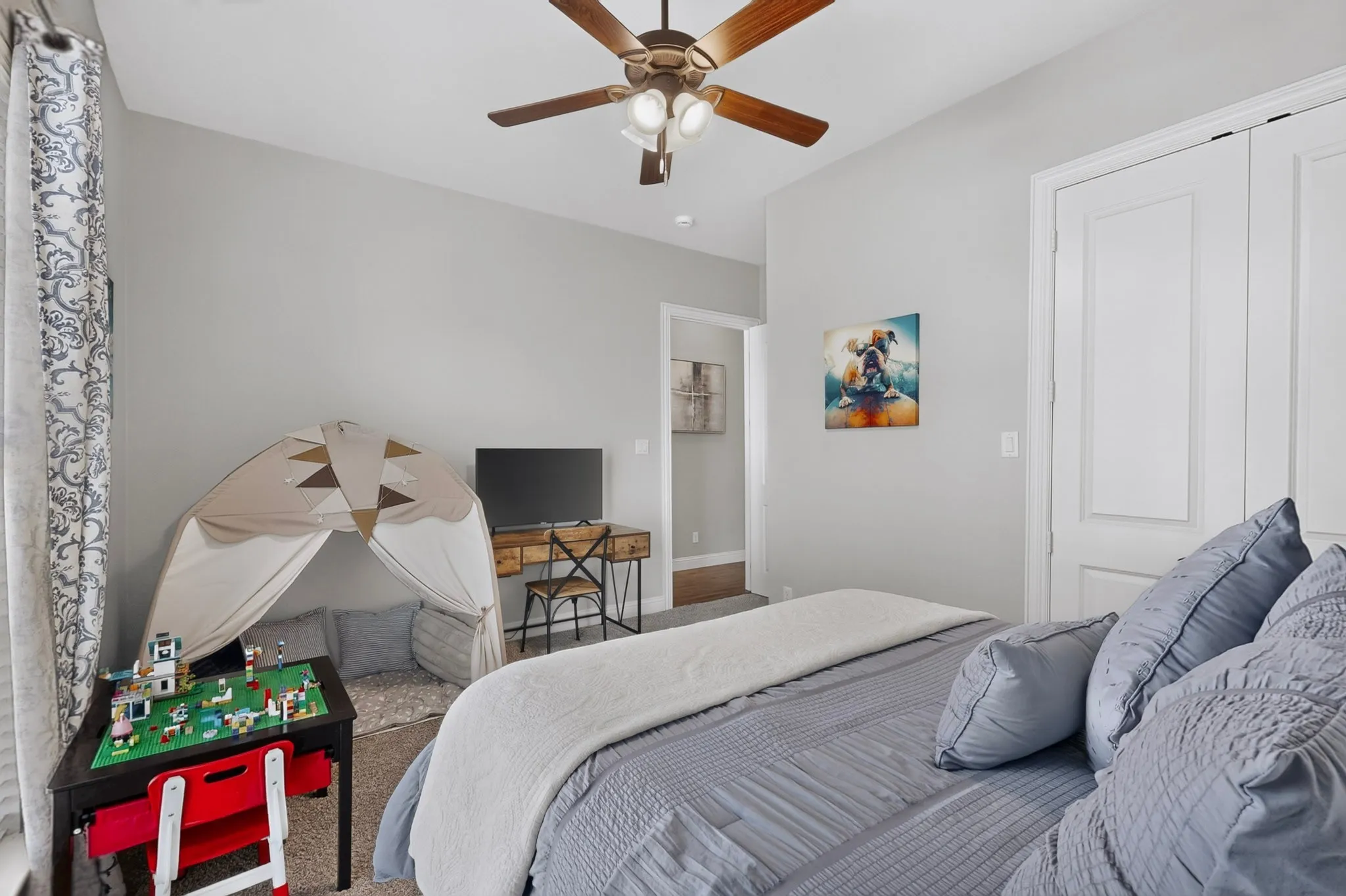 Recessed lighting, ceiling fan, carpet flooring, and white paneled doors
