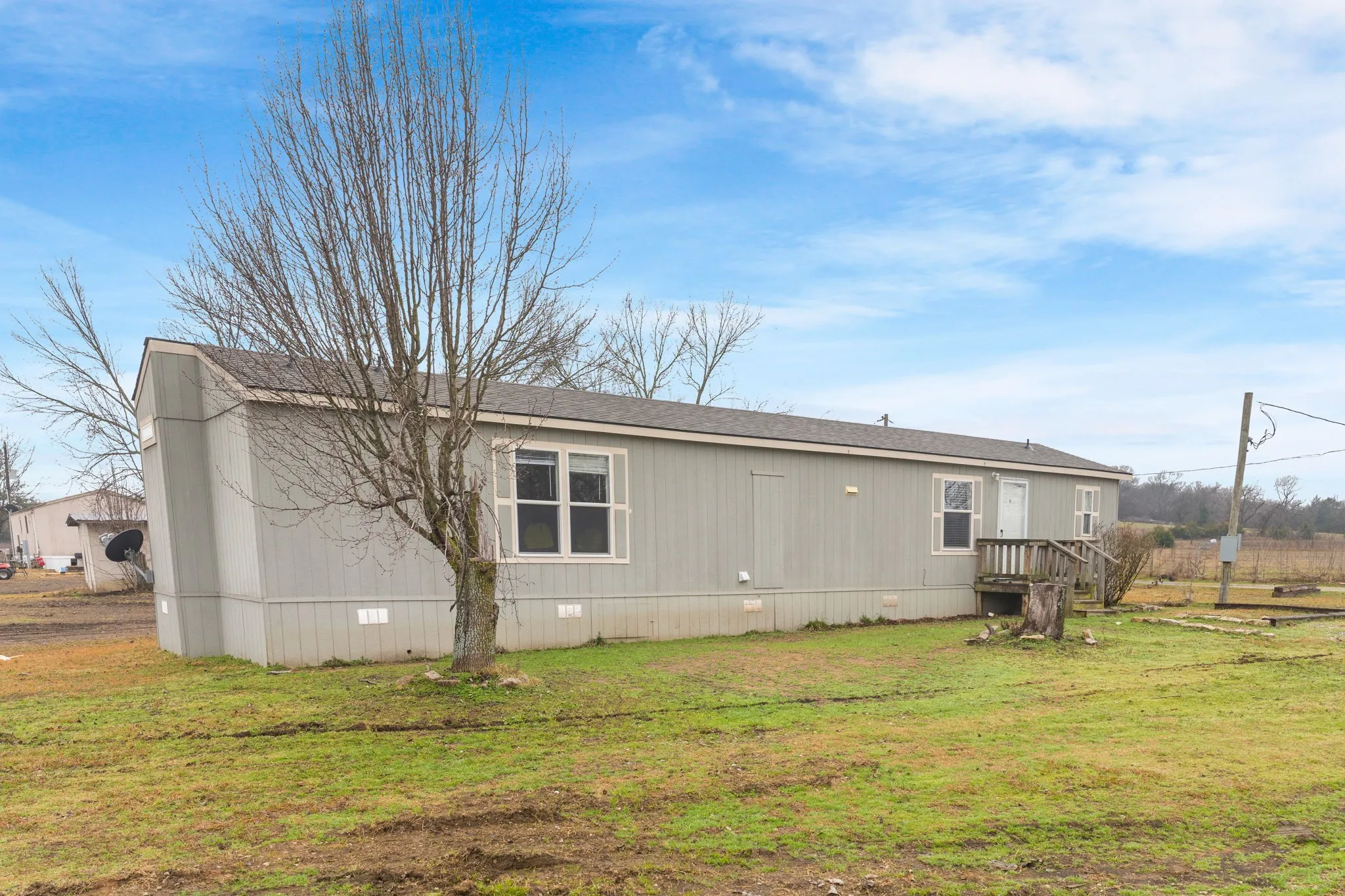 View of home's exterior featuring a yard