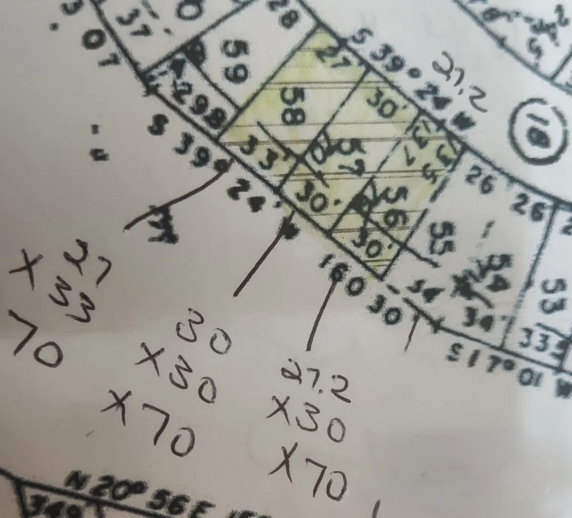 Plat Map, Parcel Delineation. Illustrating the boundaries and dimensions of the property with accompanying numerical notations
