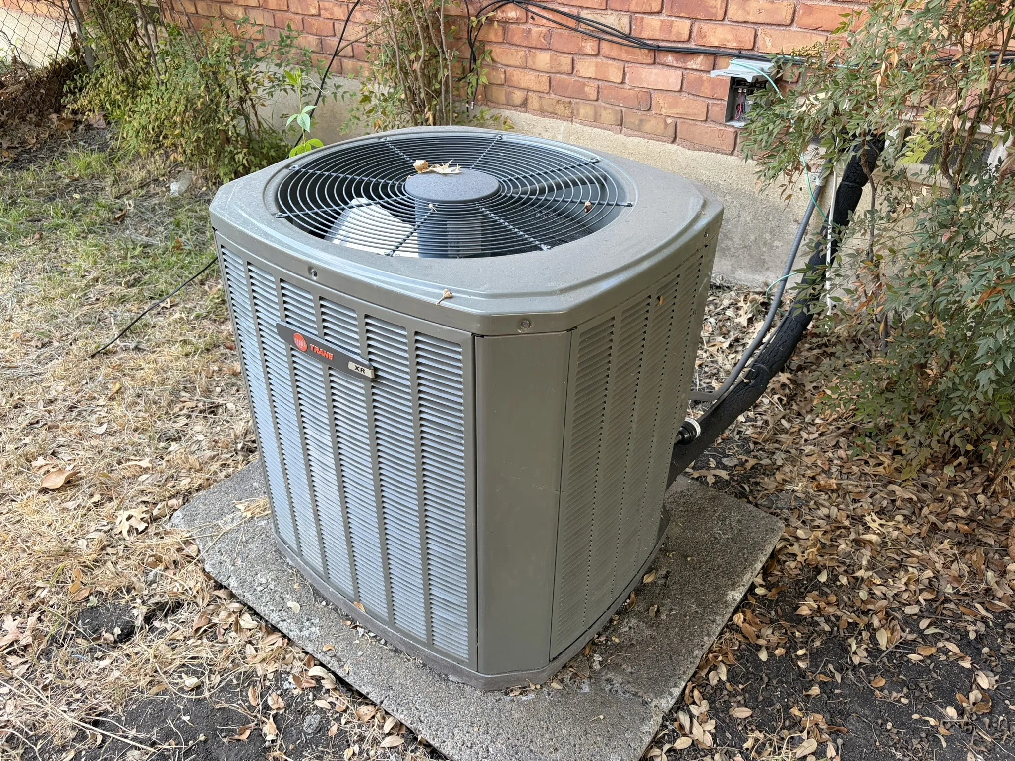 Exterior mechanical unit on a concrete pad