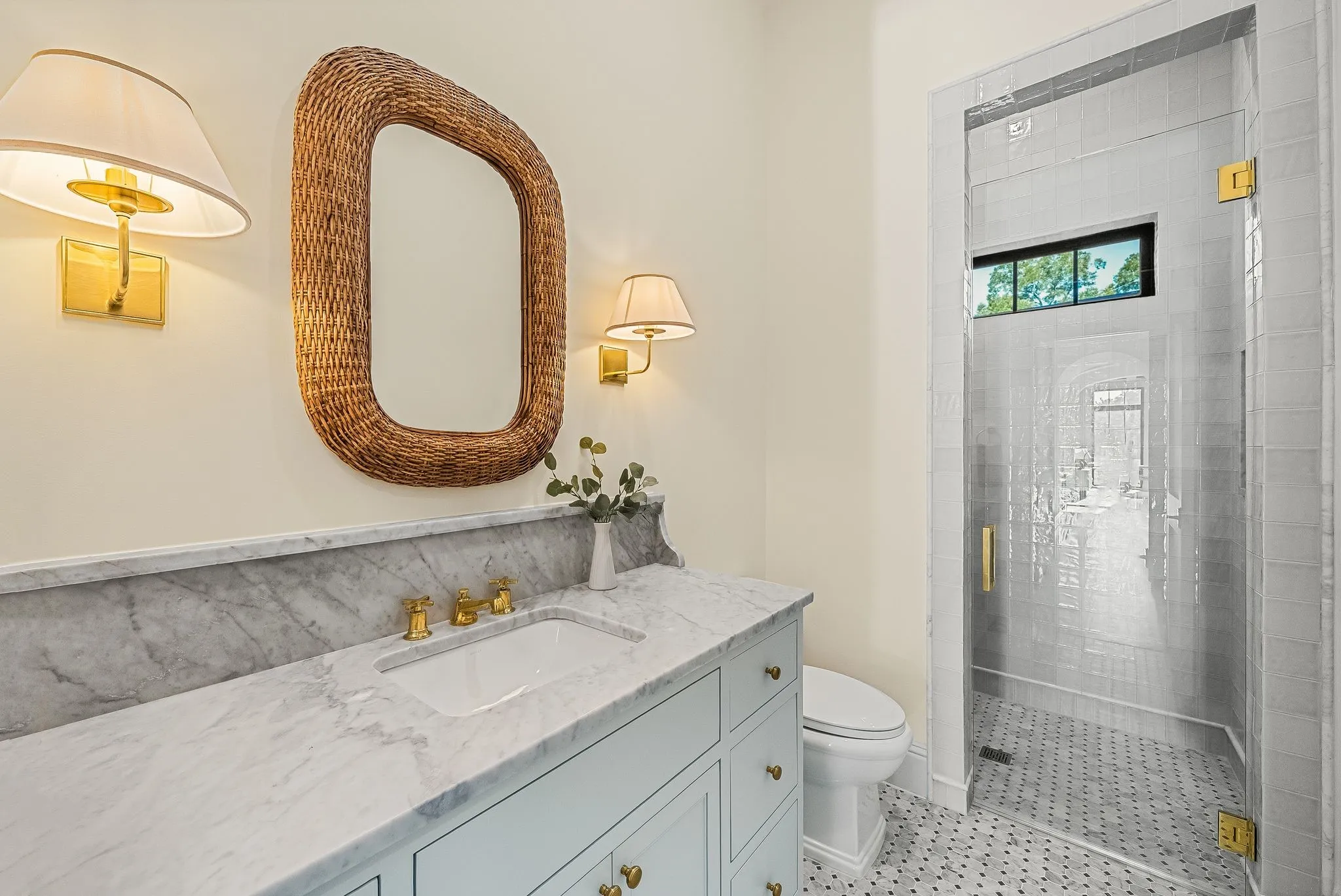Light-toned vanity with a white countertop and integrated sink