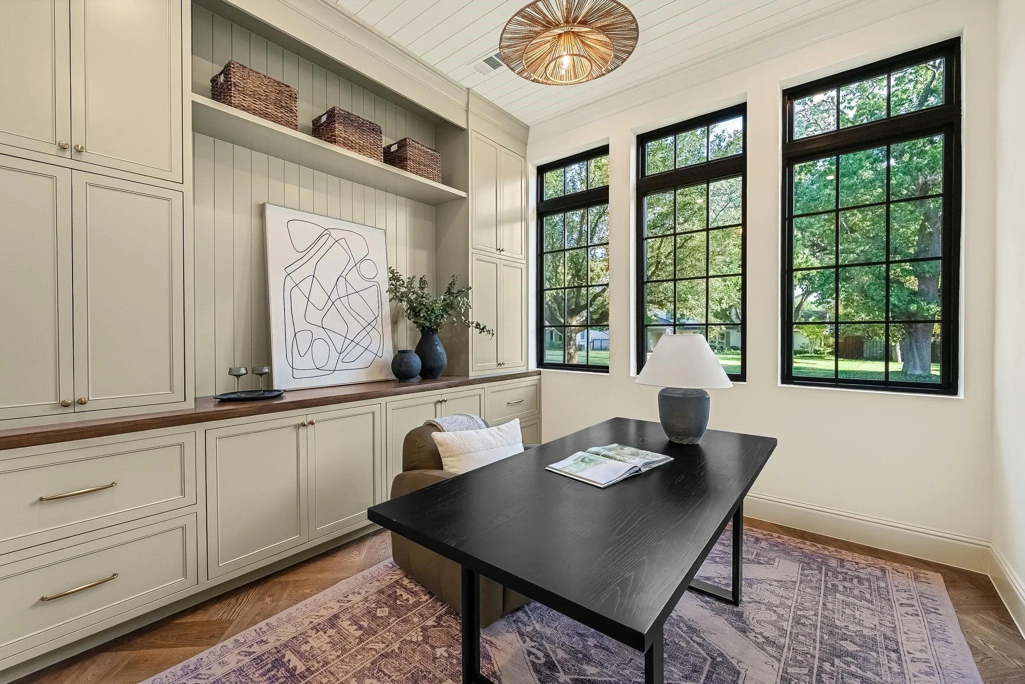 Built-in cabinetry with wood countertops, beadboard accents, and open shelving