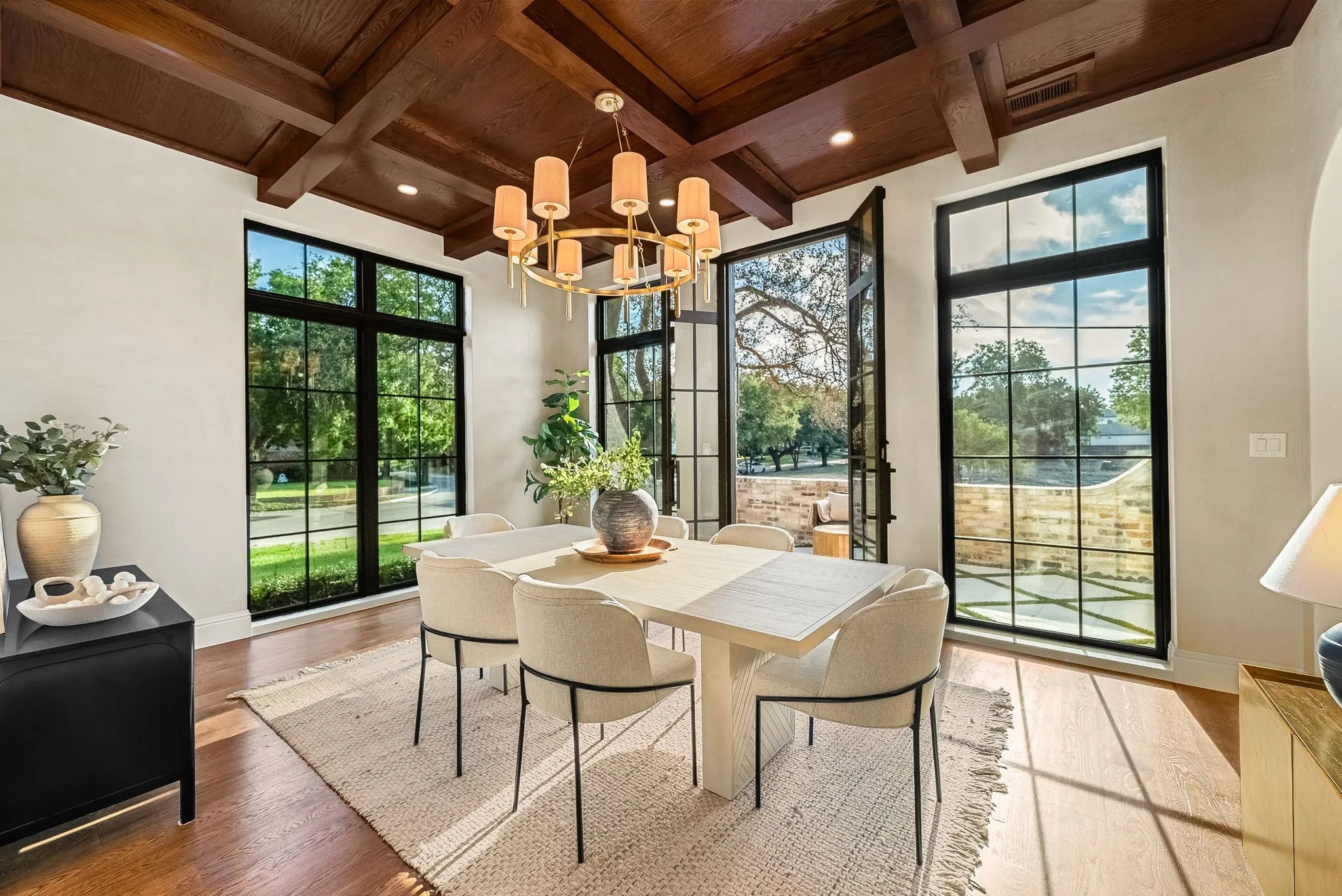 Coffered wood-finish ceiling, iron-frame windows, and wood-finish flooring