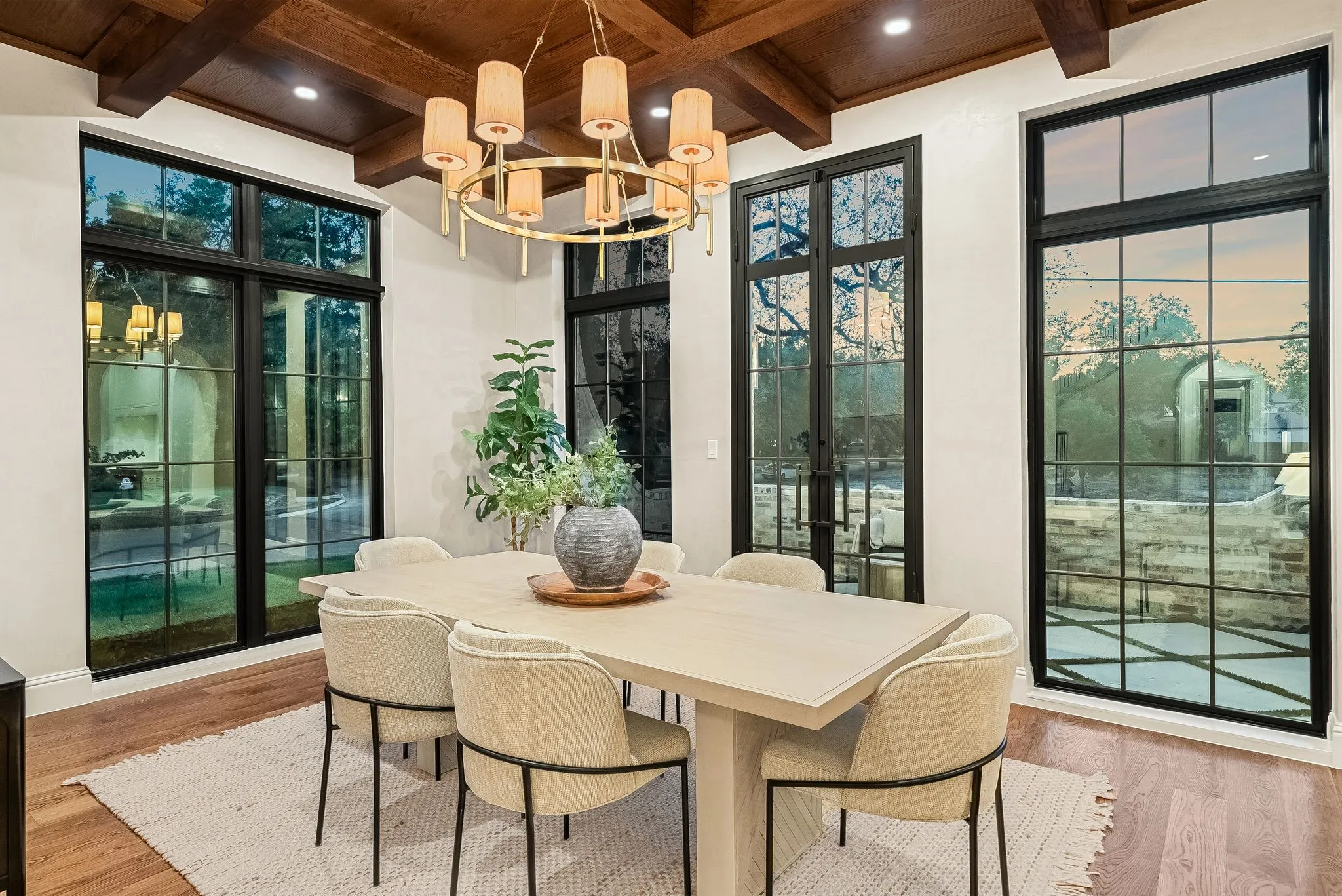 Wood-beamed ceiling with recessed lighting