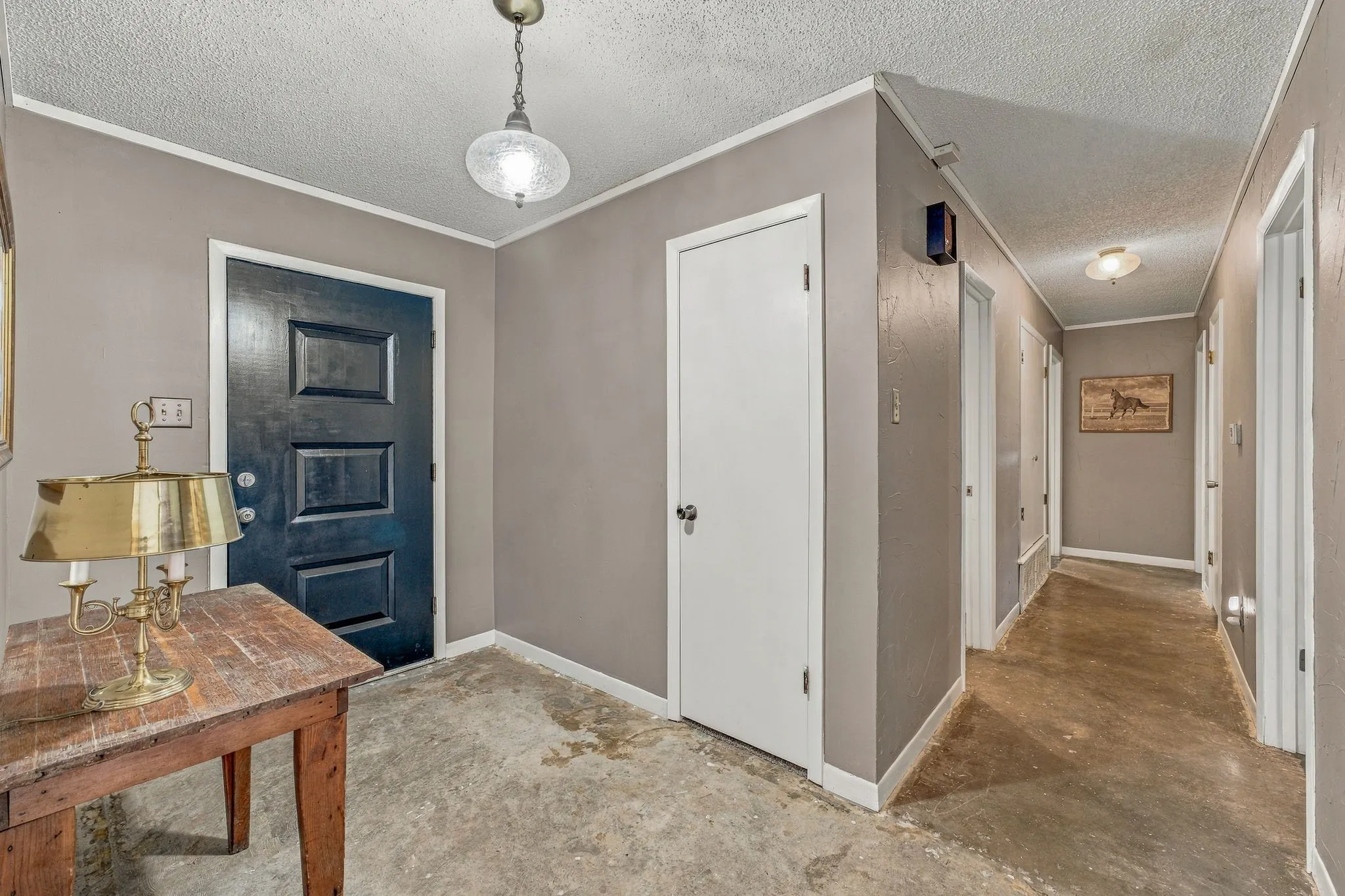 Neutral toned walls complement the durable flooring