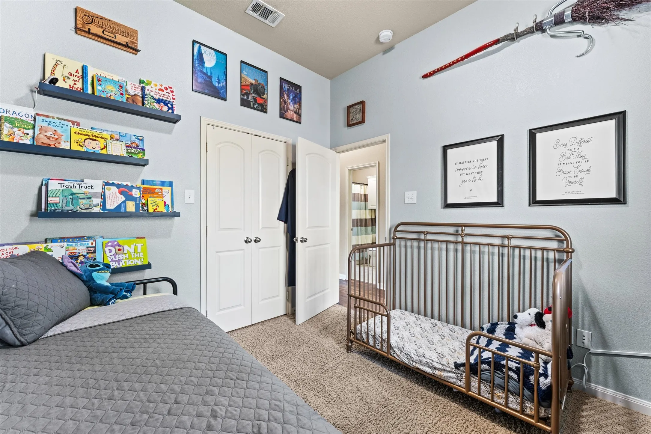 Built-in shelving, light-colored walls, and carpet flooring