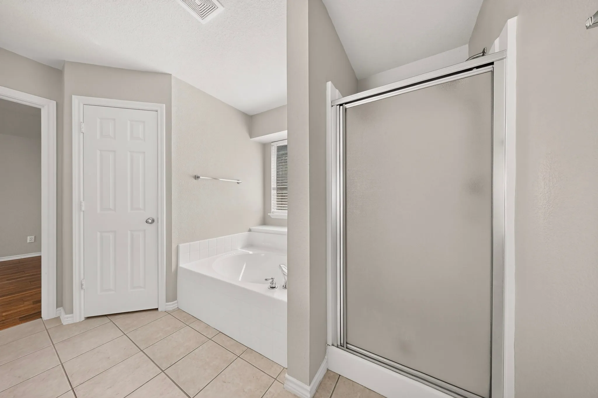 Shower and tub side by side