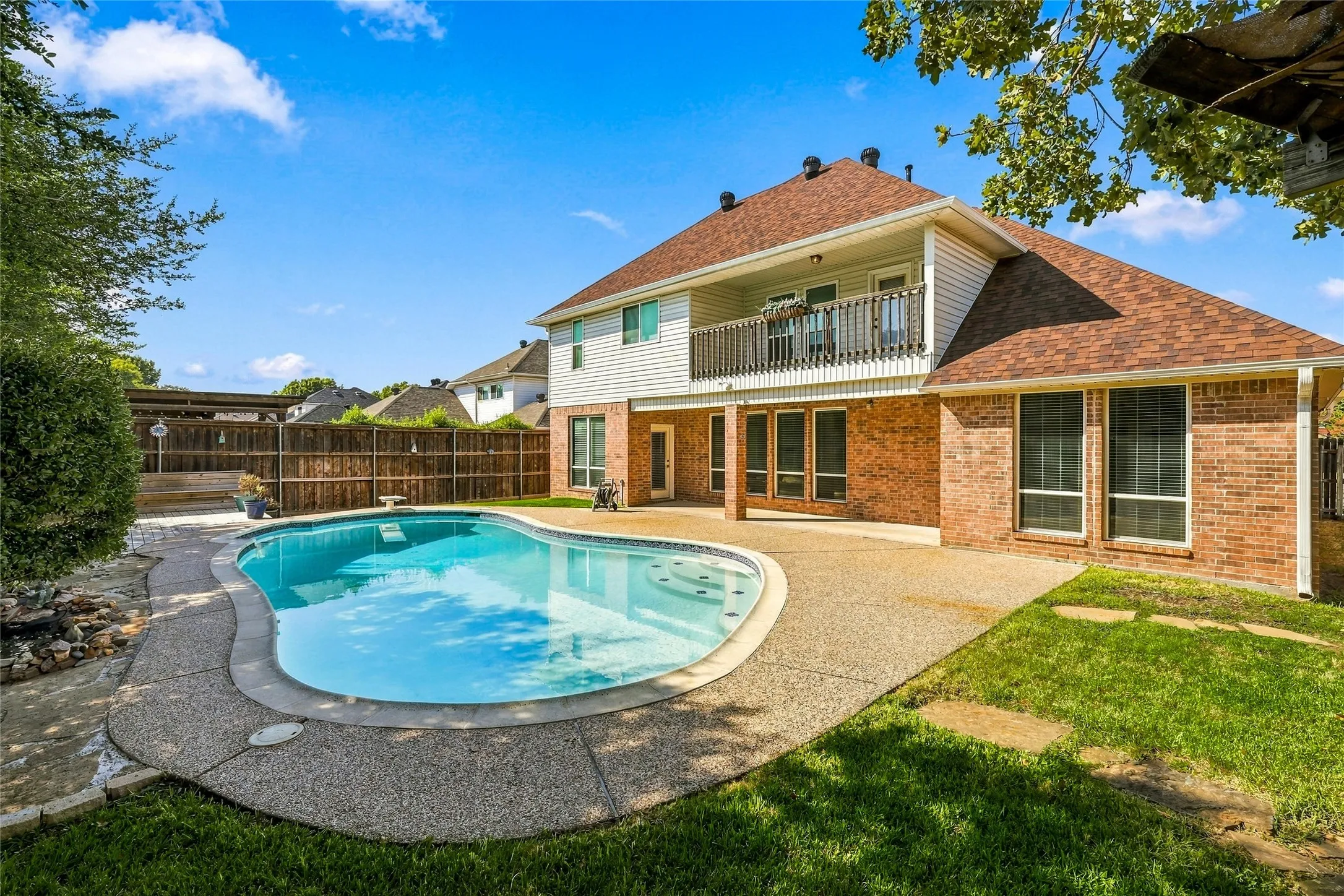 Large backyard has room for a trampoline or playset, the kids can have a great time out here