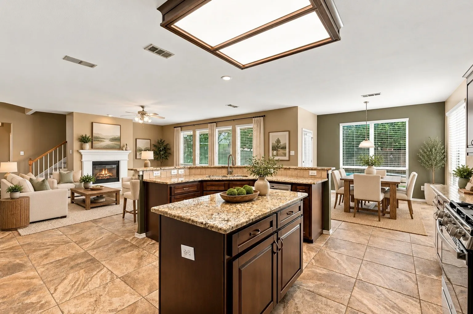 Staged photo of kitchen, living space