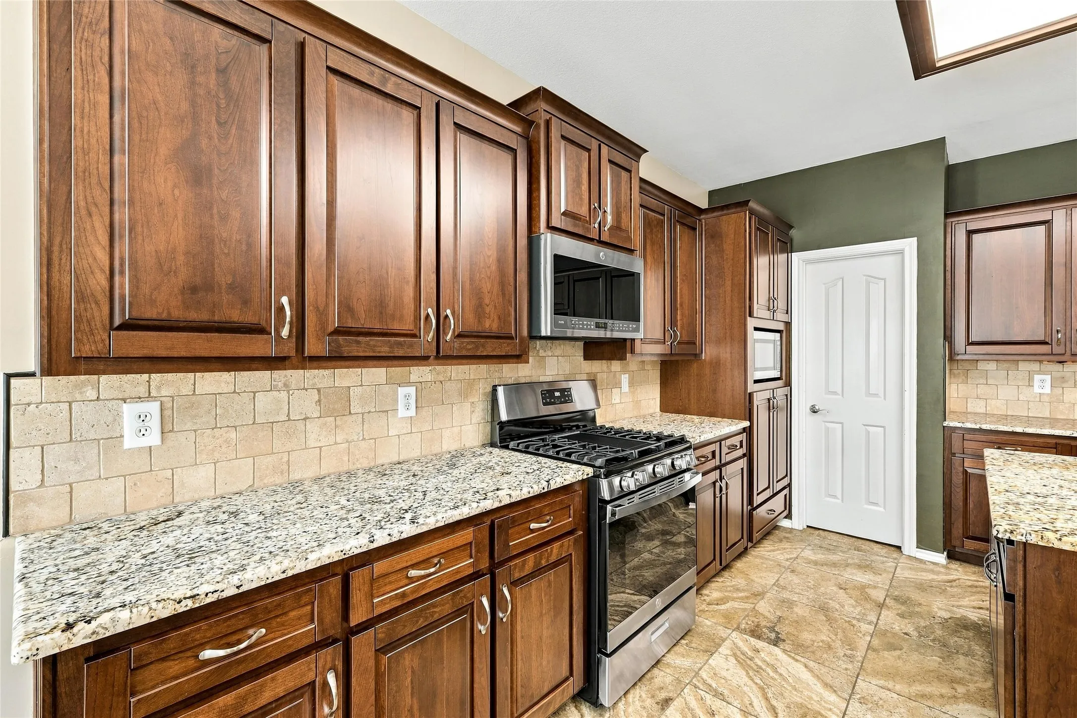 Plenty of cabinet and storage space. Walk in panty