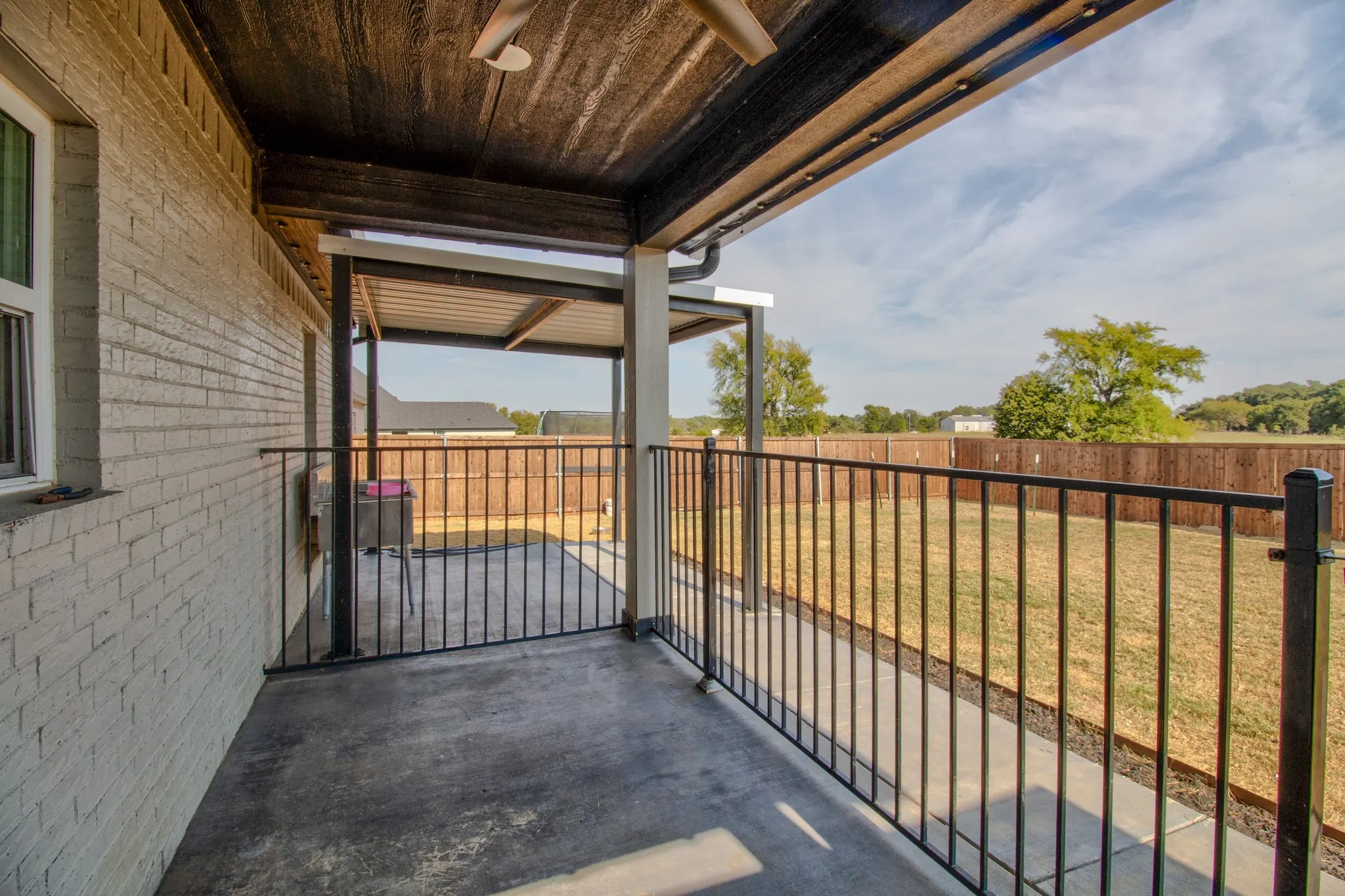 Closed in area on the back patio perfect for those fur babies!