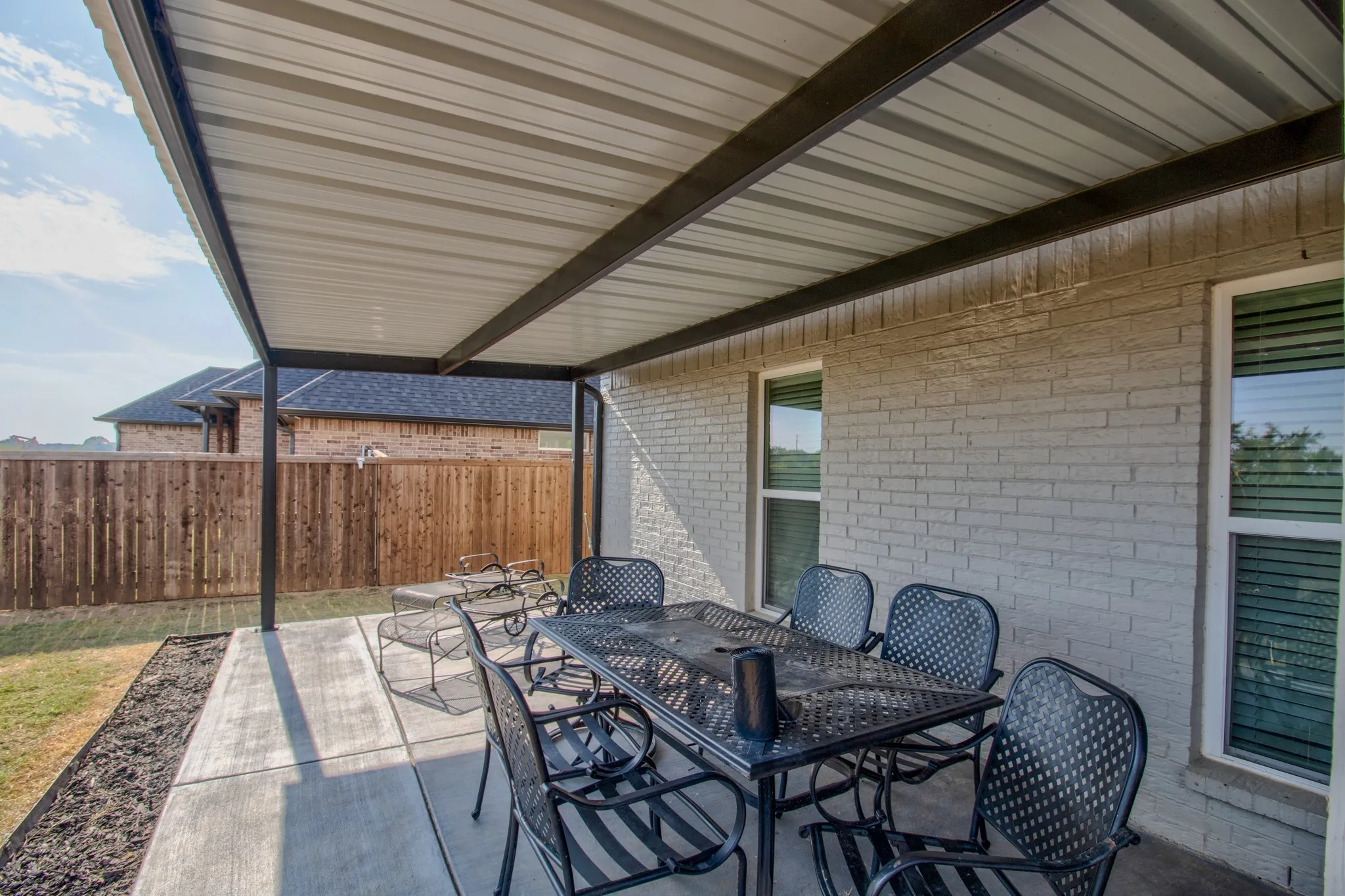 Enjoy relaxing and enjoying friends and family on the covered back patio.