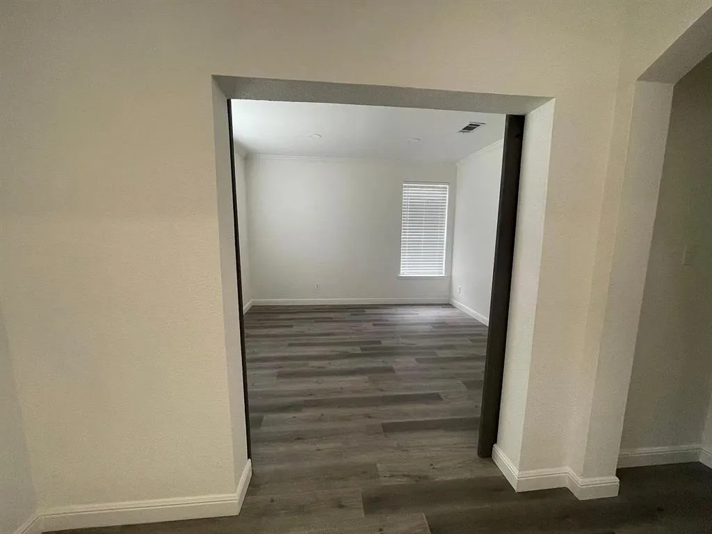 Wood-finish flooring throughout