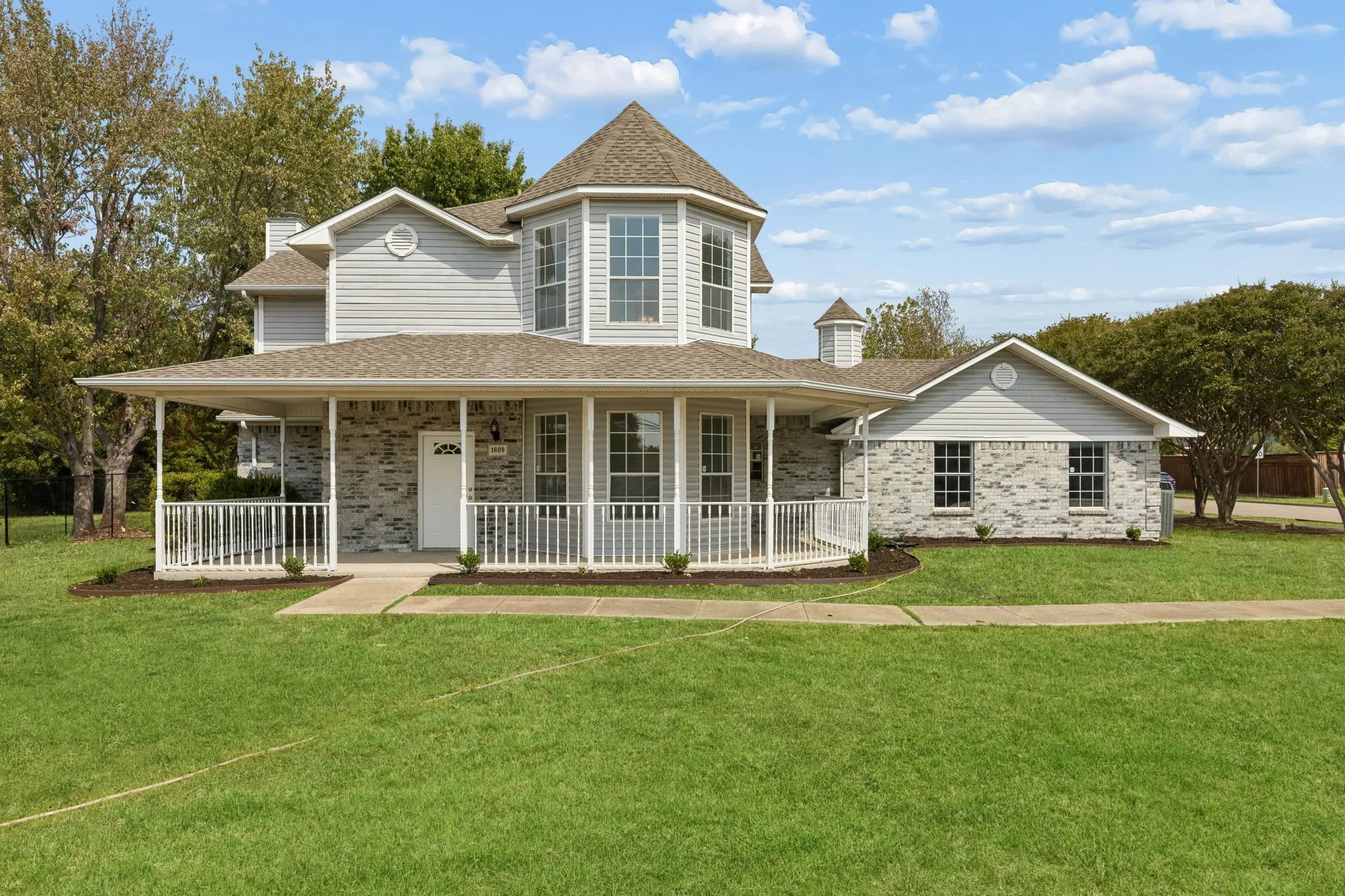 Charming wrap around front porch