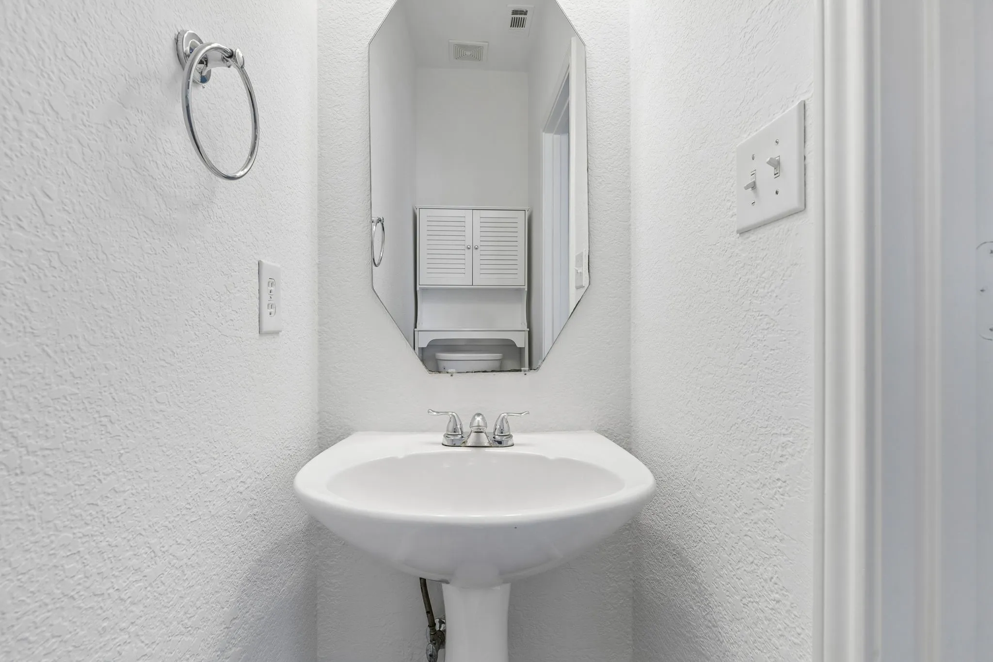 Powder Bath downstairs conveniently located off Living Room