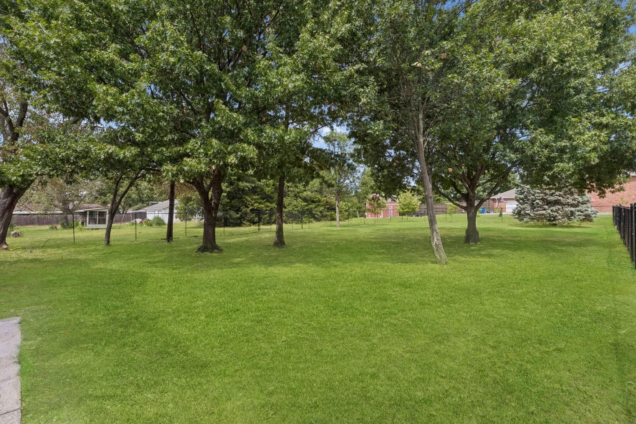 On almost an acre with NO HOA and mature trees!