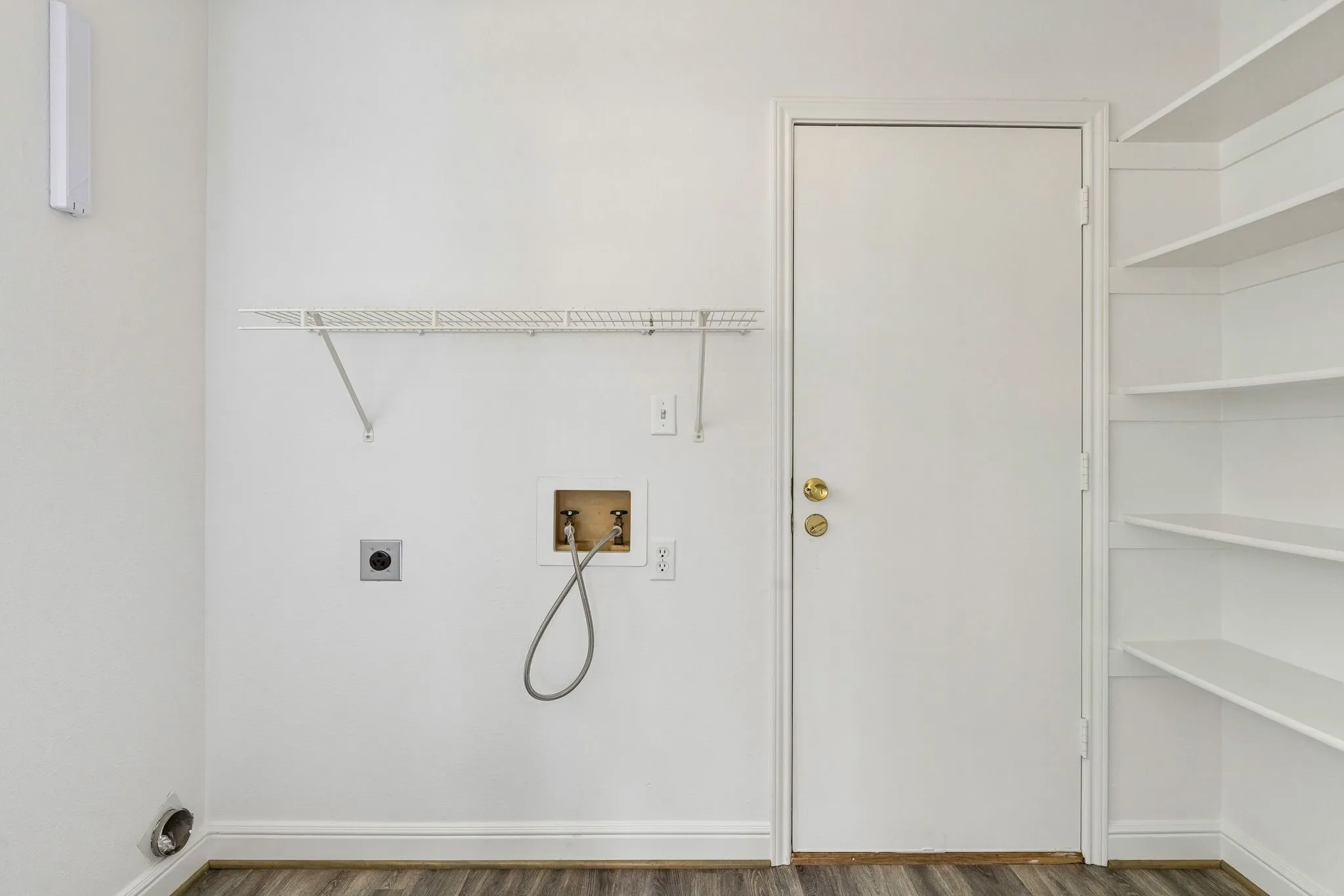 spacious utility room. The door leads out to the oversized 24x18 garage with utility sink!