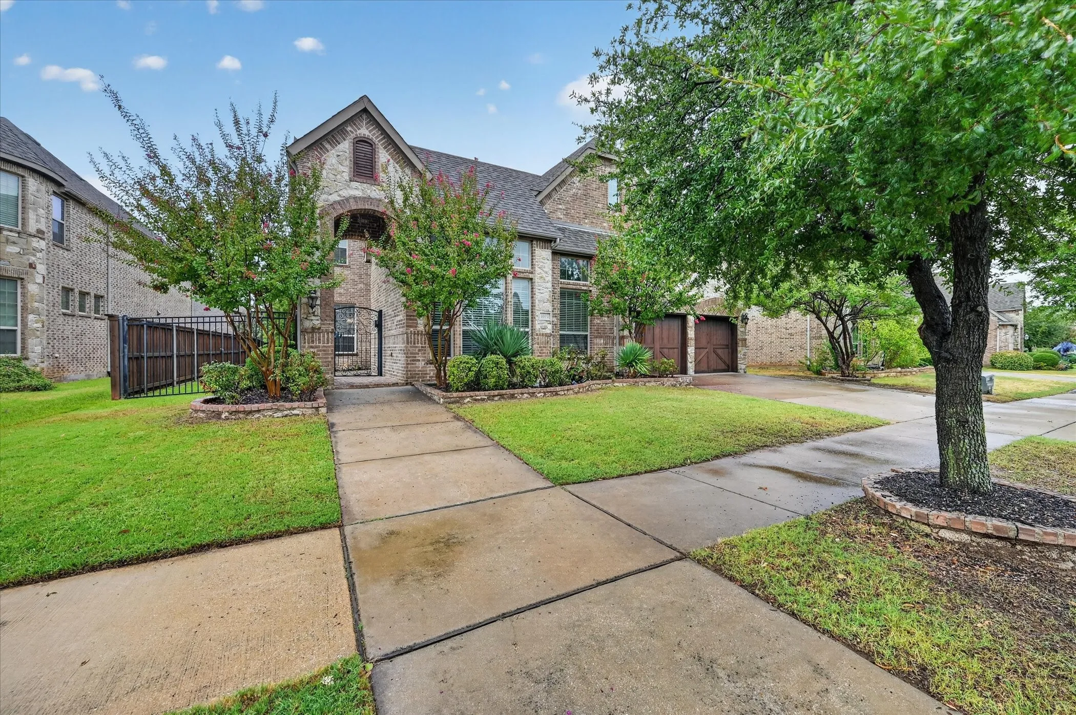 Brick and stone exterior with arched entry
