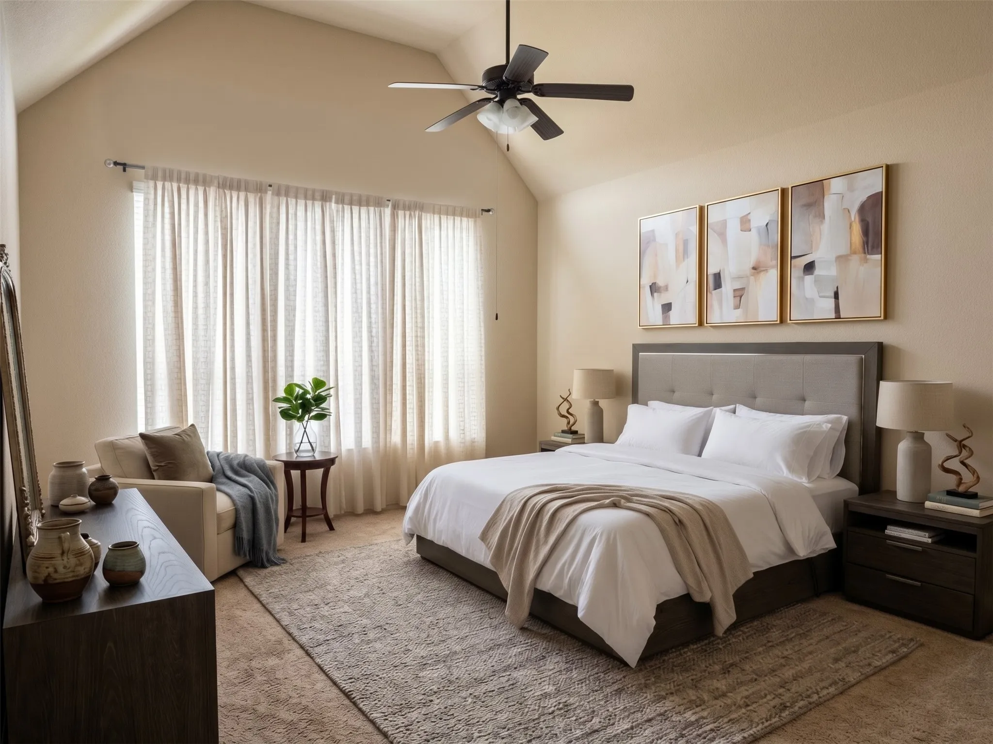 Vaulted ceiling, wide window with drapes, ceiling fan with integrated lighting, wood-finish flooring, and upholstered headboard