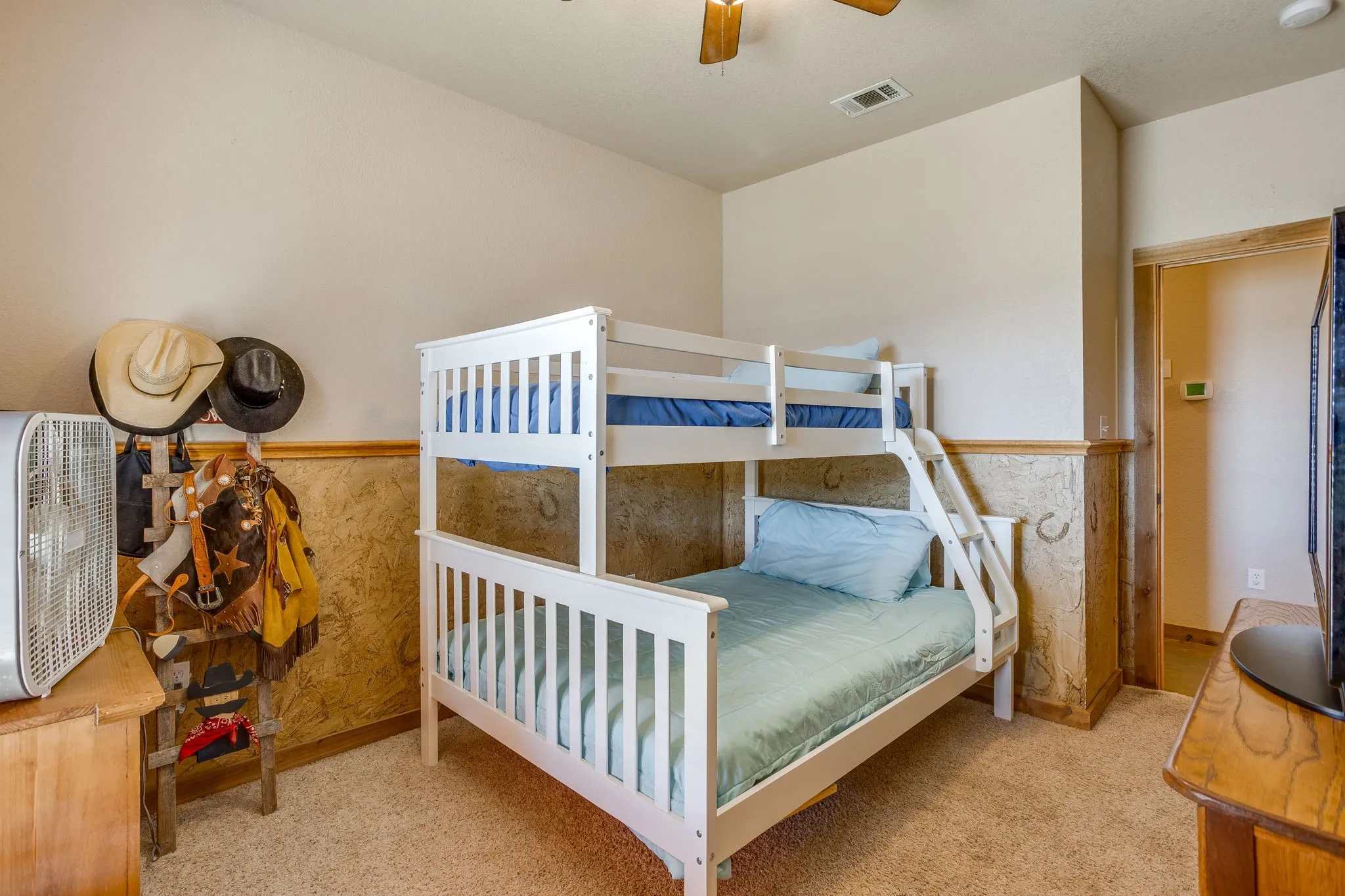 Recessed lighting, ceiling fan, and carpeted flooring