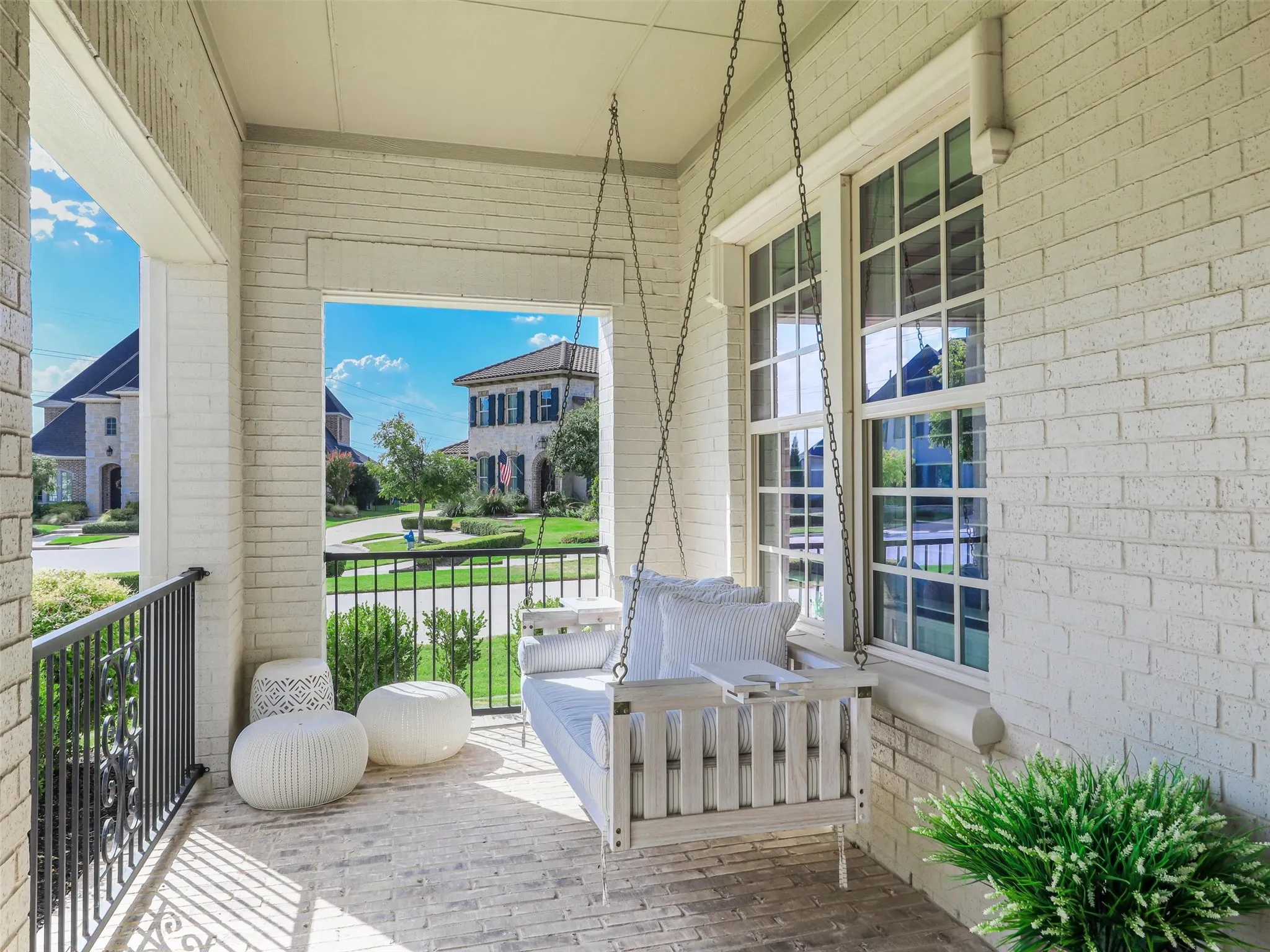 Covered front porch with swing. Additional features elevate the home's comfort and functionality, including surround sound in the living room, dining room, primary bedroom, pool, and outdoor patio areas; a whole-house water filtration system; a reverse osmosis system; and an HVAC system that was replaced and upgraded approximately four months ago. A spacious three-car garage provides additional parking and storage.