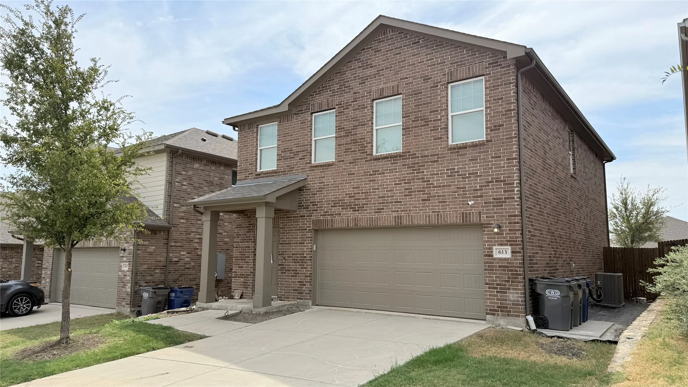 Brick exterior with a covered entry