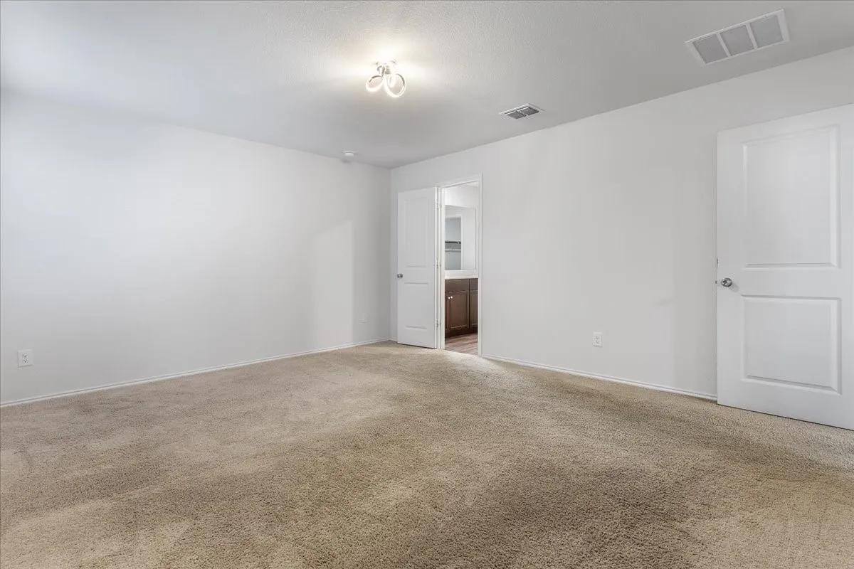 Spacious primary bedroom