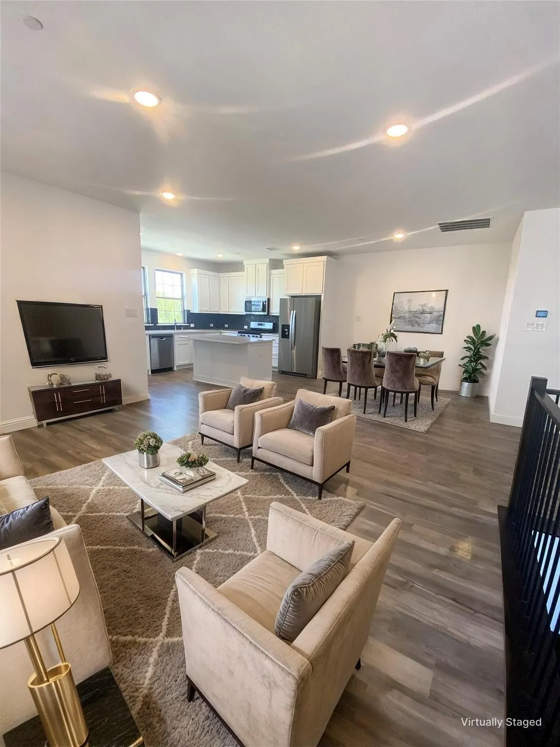 Open Floorplan with Living, Dining and Kitchen Areas