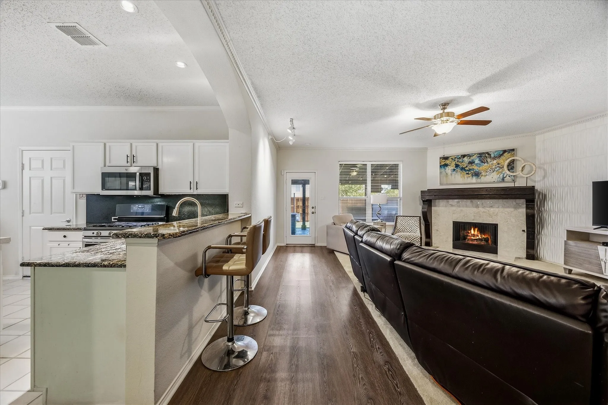 Breakfast bar overlooks kitchen