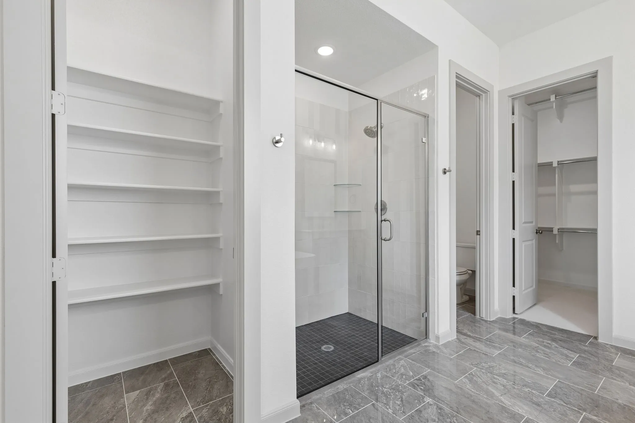 Featuring a wonderful walk in shower, linen closet and owner's closet with seasonal hanging space, this over the top owner's bath is a dream come true!