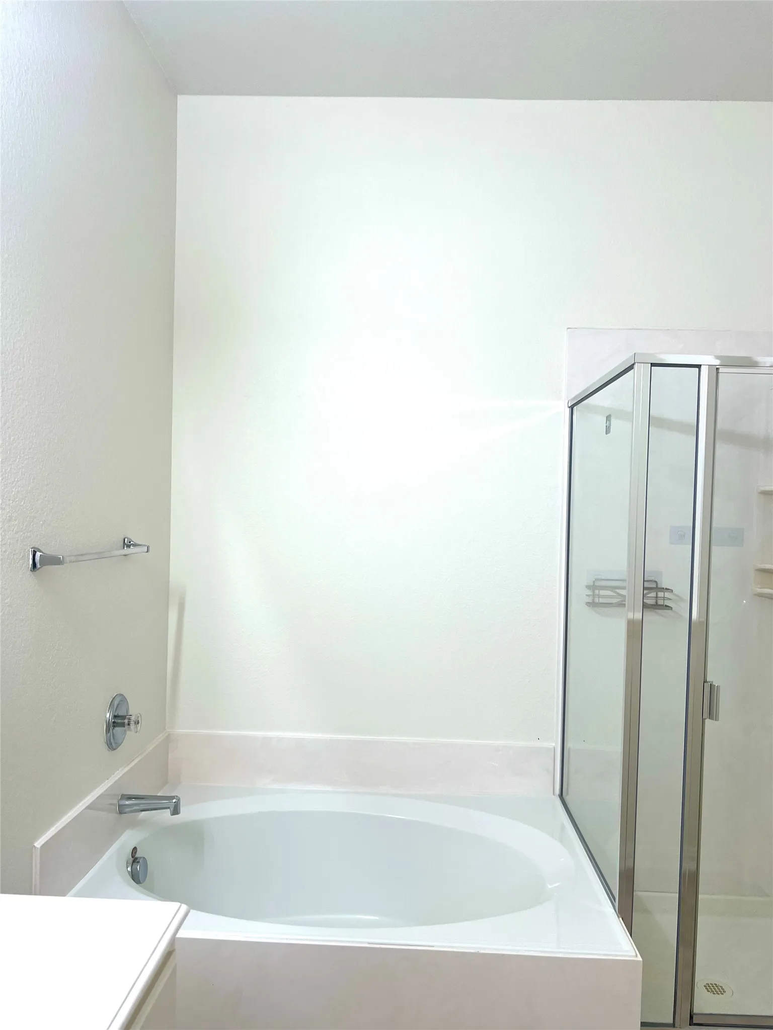 Full bathroom with a bath, a shower stall, and vanity