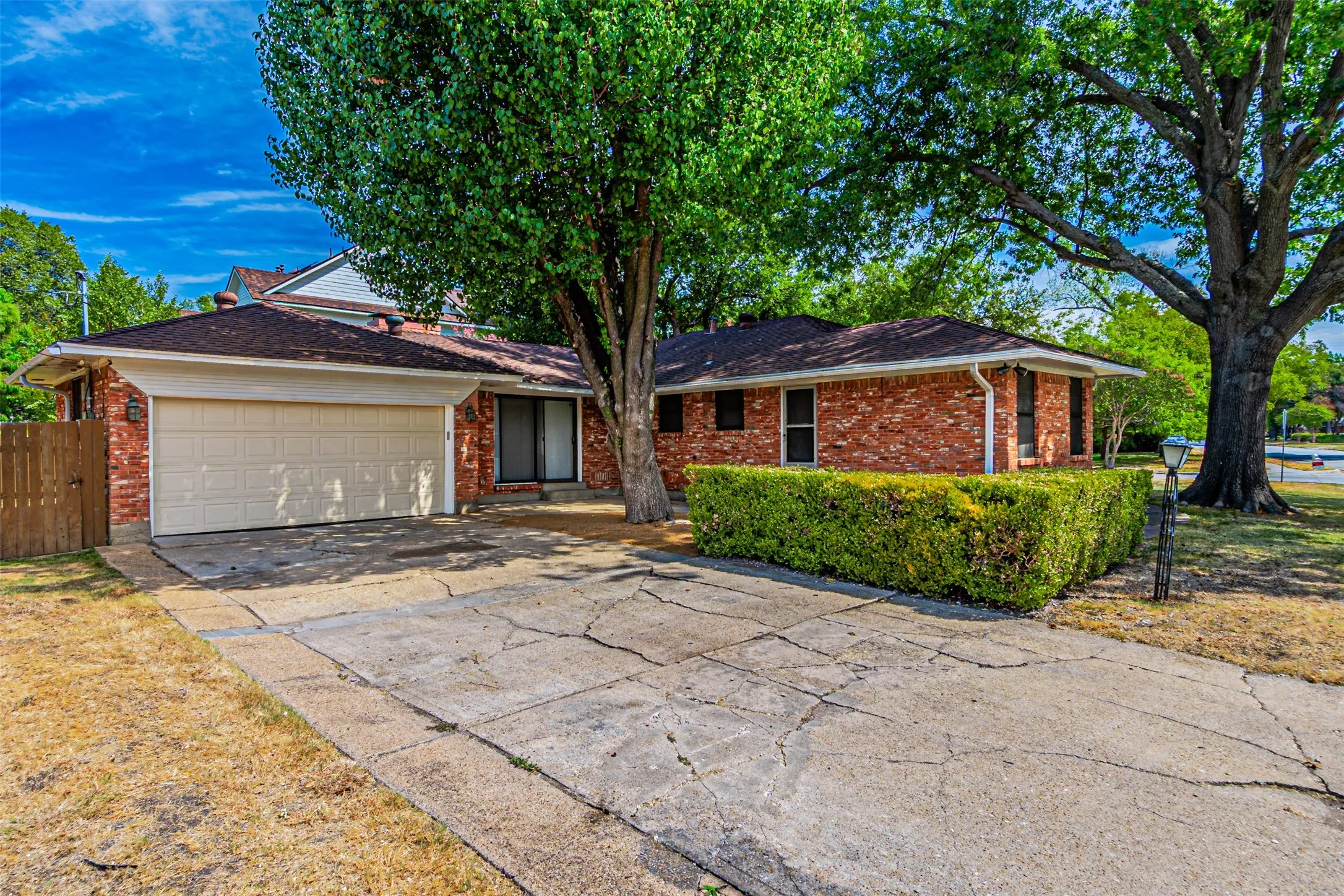 Brick exterior with a garage door