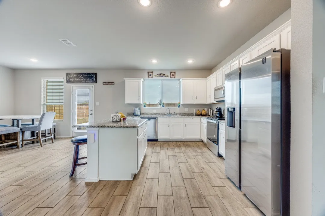 Open to dining and Living room with view yard