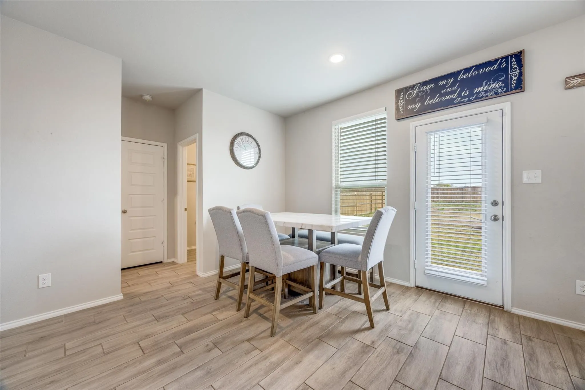 with lots of natural light and view of backyard