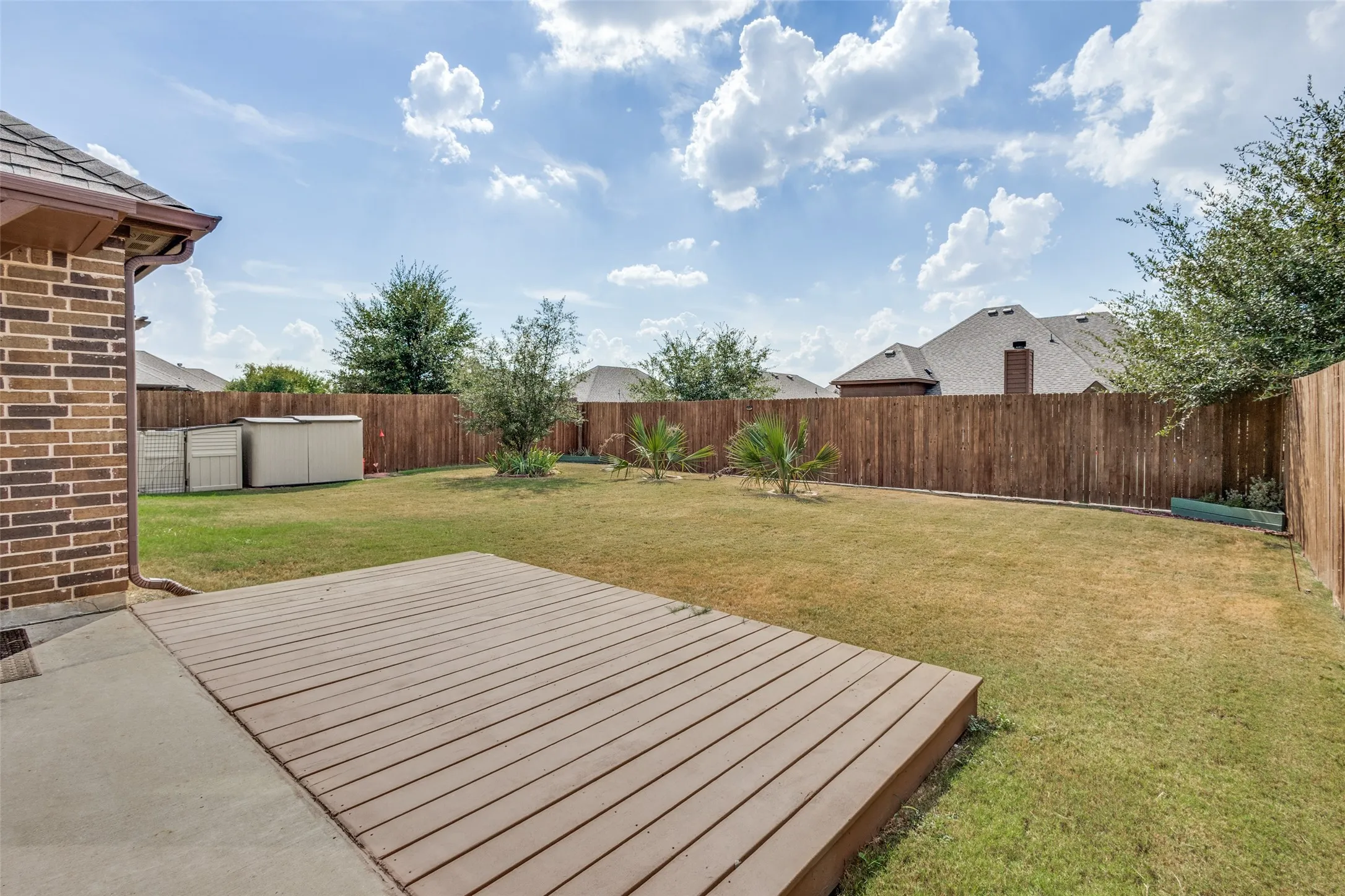 The yard is private and nicely landscaped, along with some additional storage.