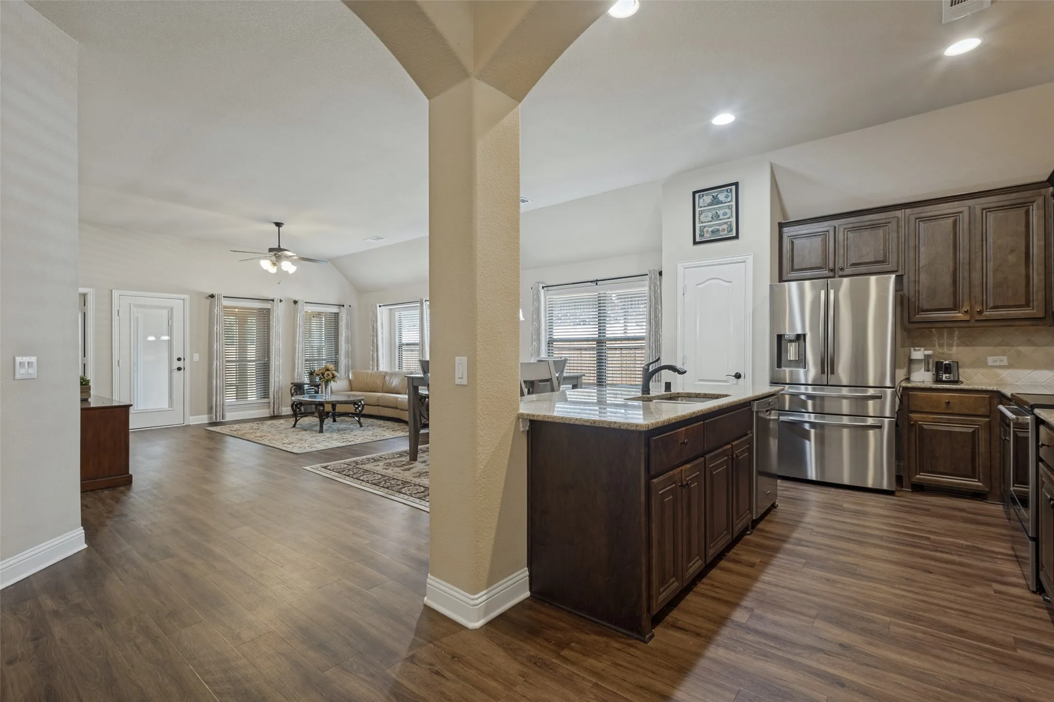 Luxury vinyl plank flooring throughout main areas.