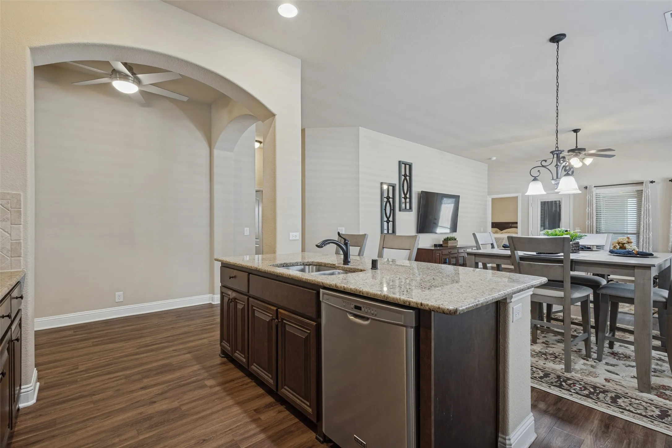 Stylish rounded corners and archways and 5.25" baseboards throughout.