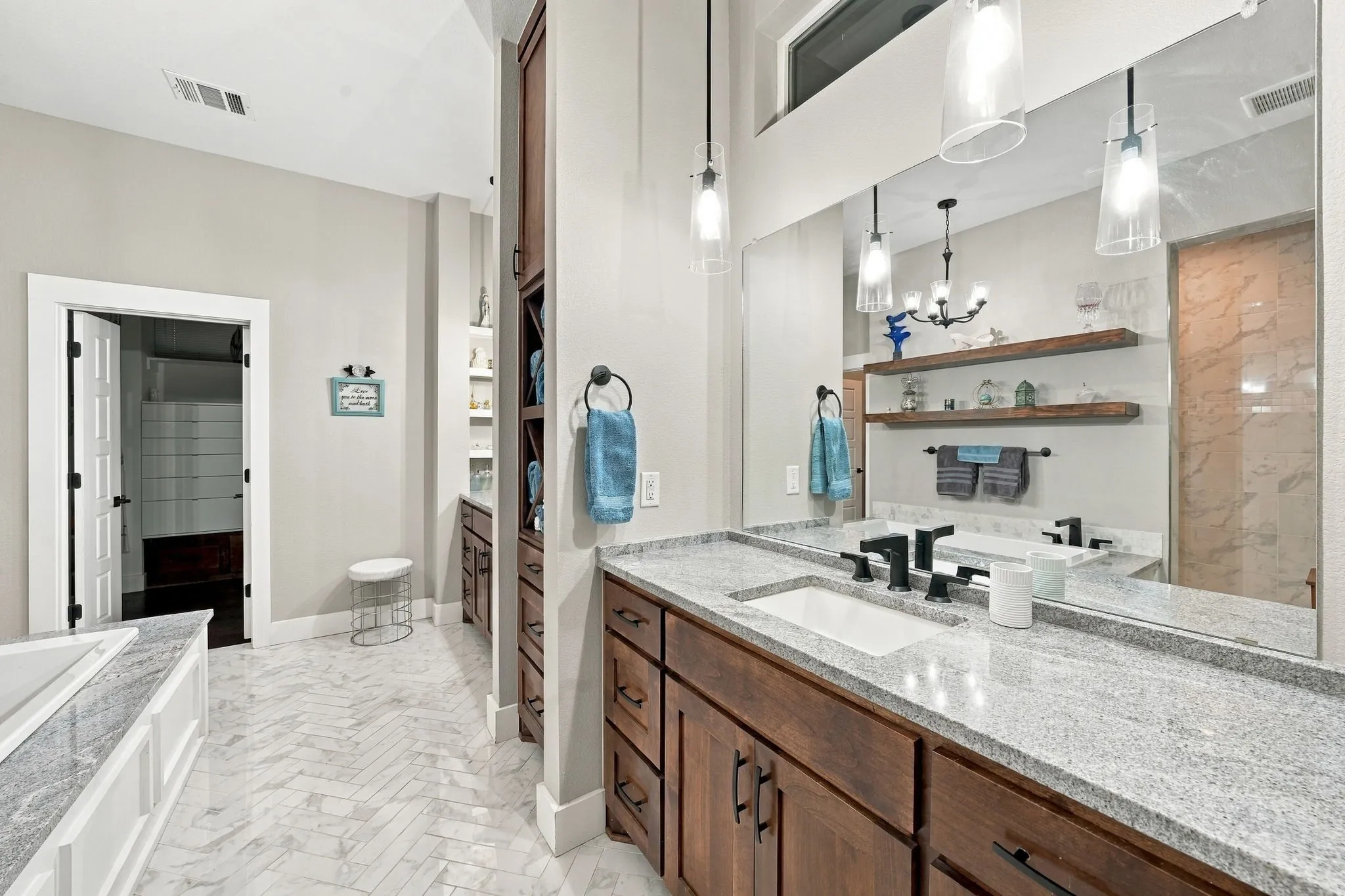 Primary bathroom with large walk in closet