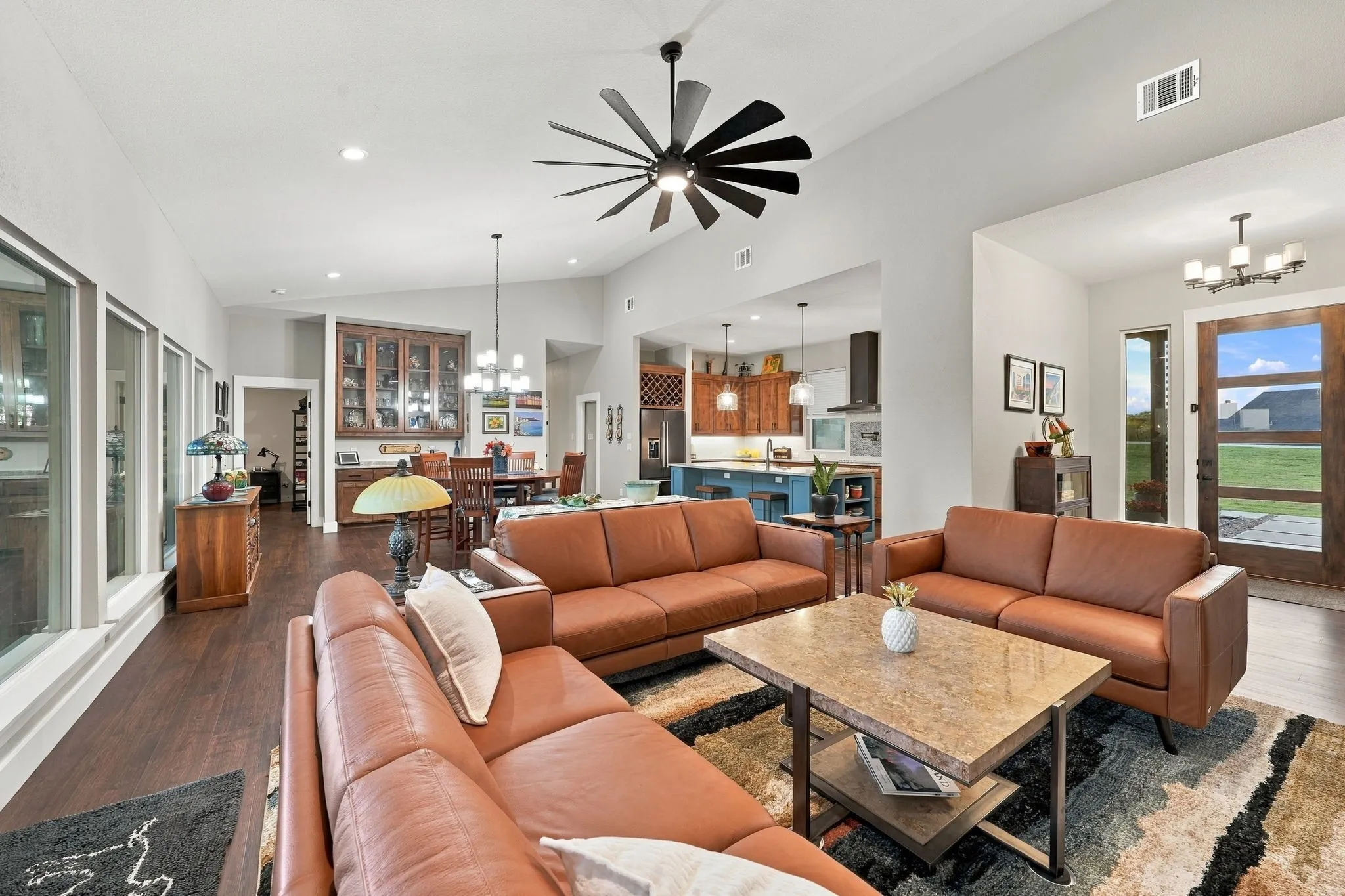 Open concept living room, kitchen, and dining room