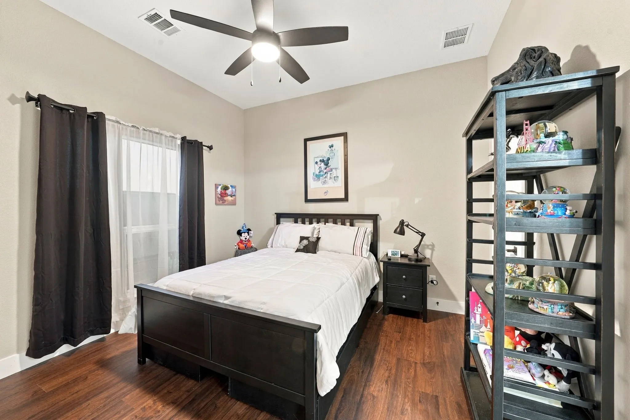 Bedroom with pocket door entry to ensuite bathroom