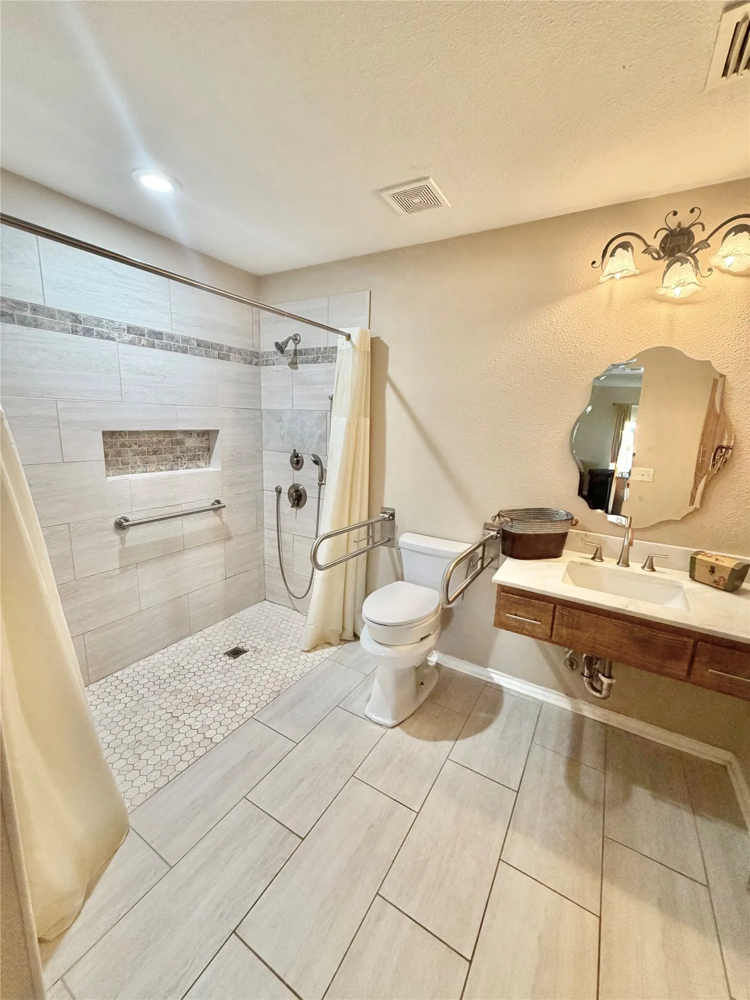 Full handicapp accessible bath with downstairs of home being accesible.
