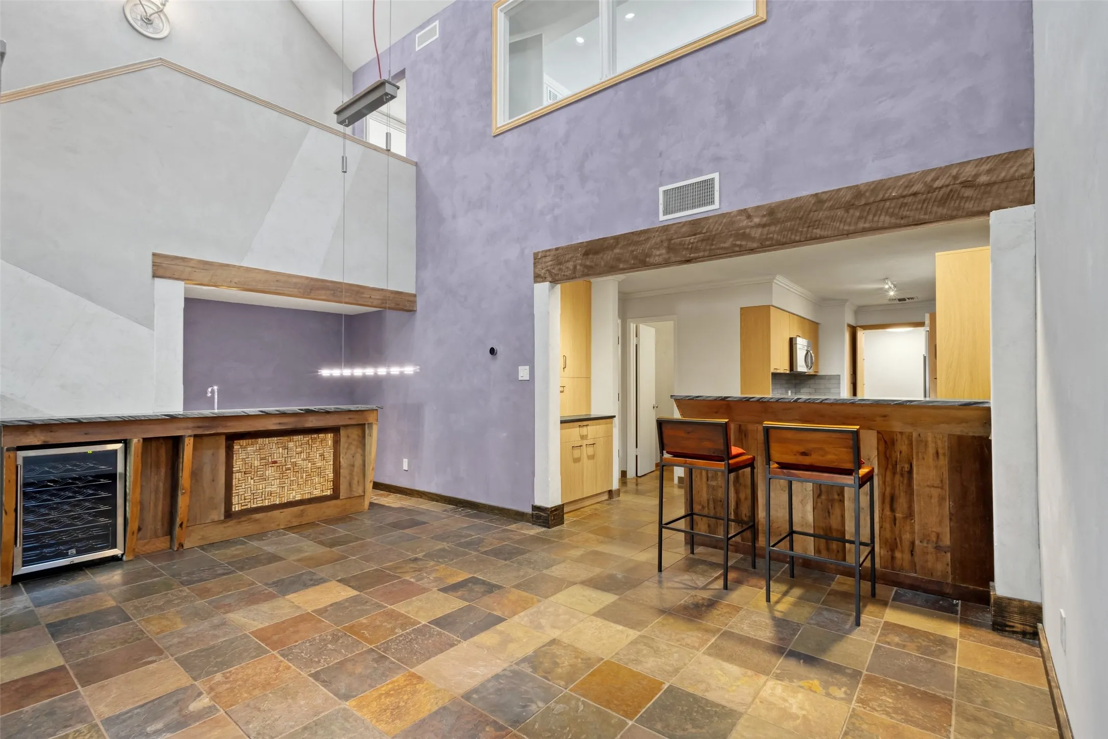 Breakfast bar & wine fridge and wet bar