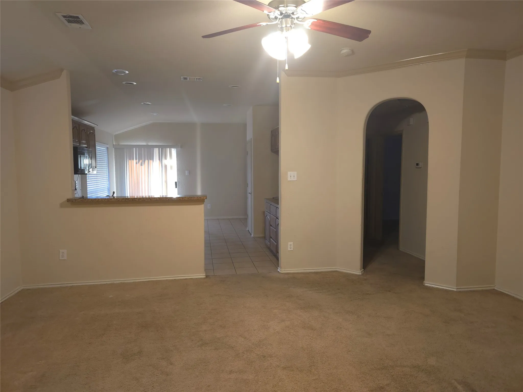 Textured carpeting and neutral wall tones