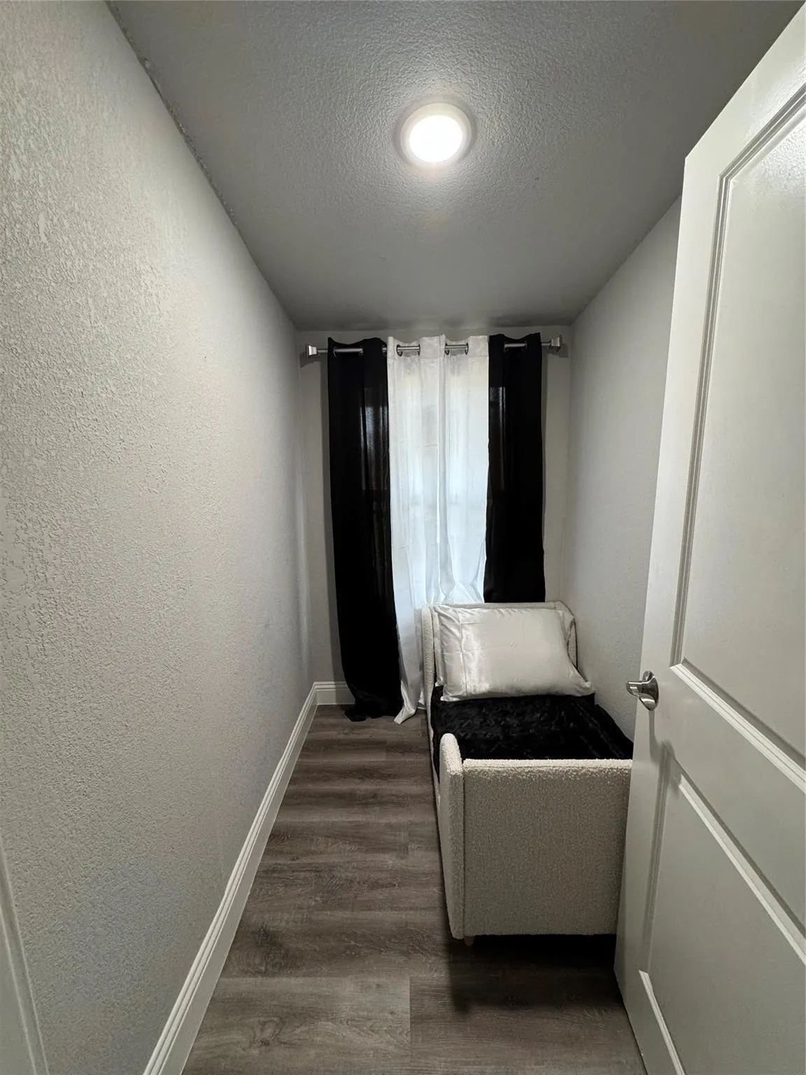 Bedroom six/toddler room with closet behind the door.
