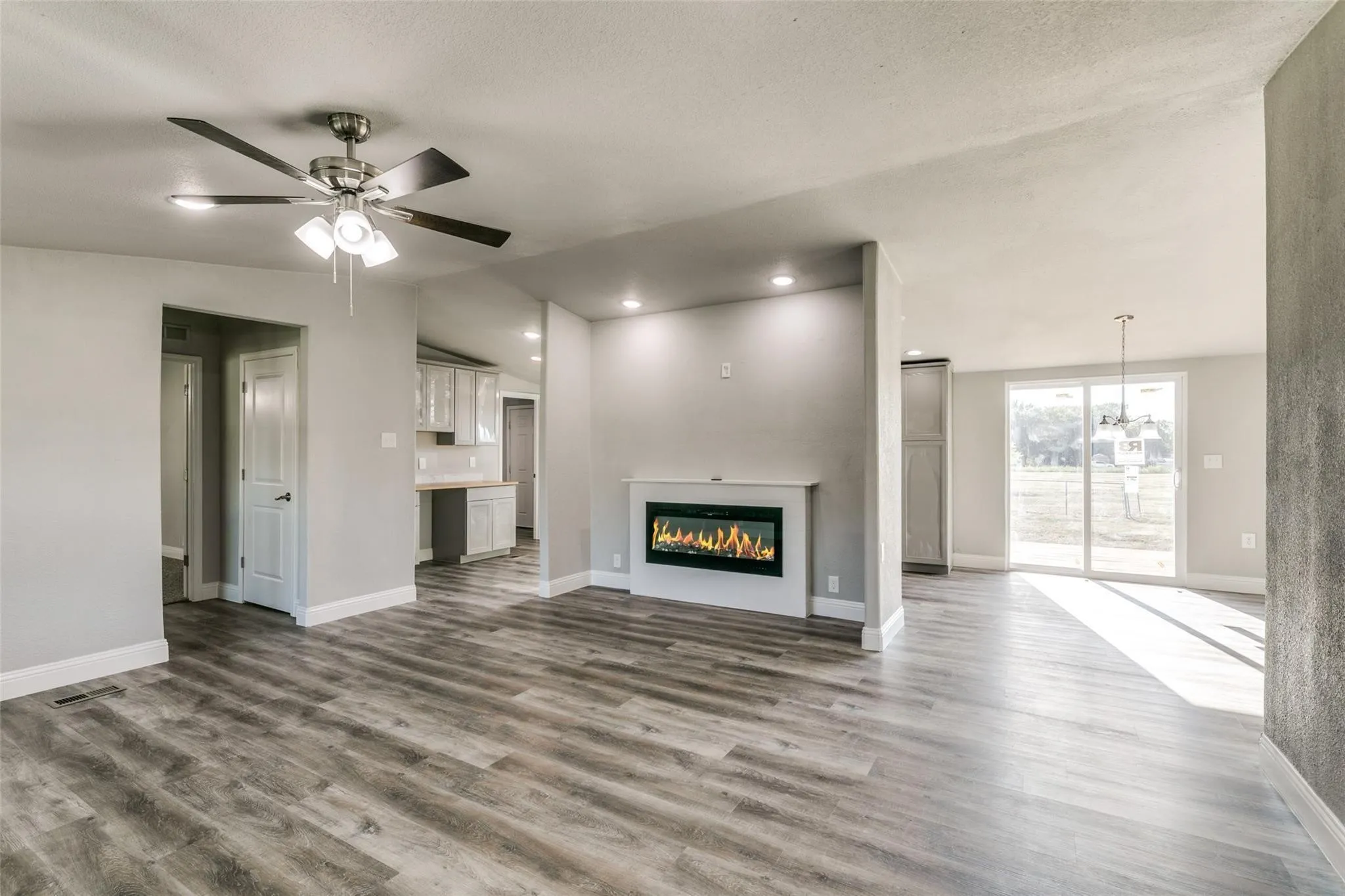 Living room featuring built in fireplace.