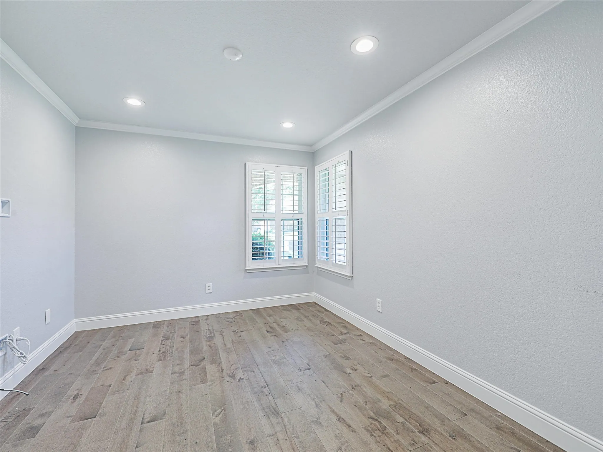 Study or extra bedroom with LVP.