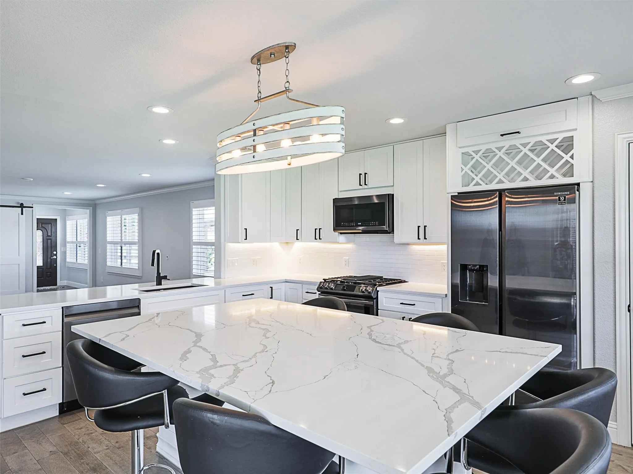 Upscale Lighting Fixtures and Wine Rack over refrigerator.