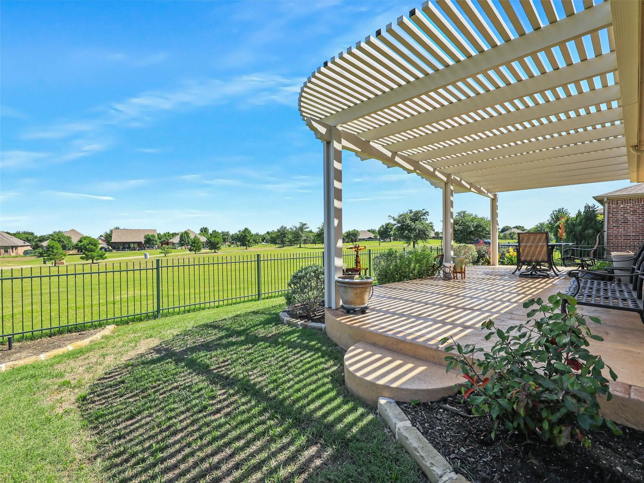 View of yard featuring a patio area and a pergola